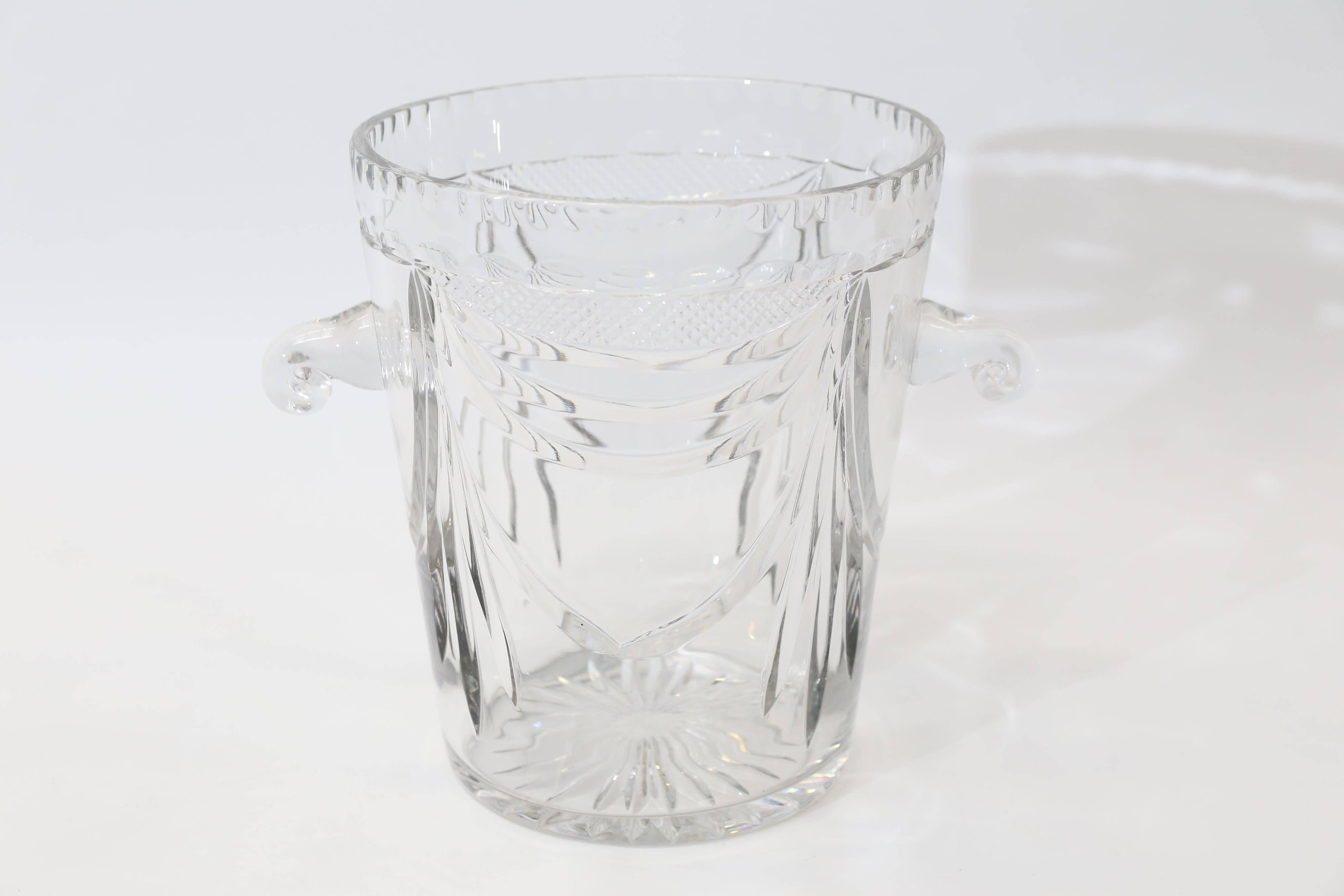 Add sparkle to any table with this beautifully cut crystal wine bucket from France.