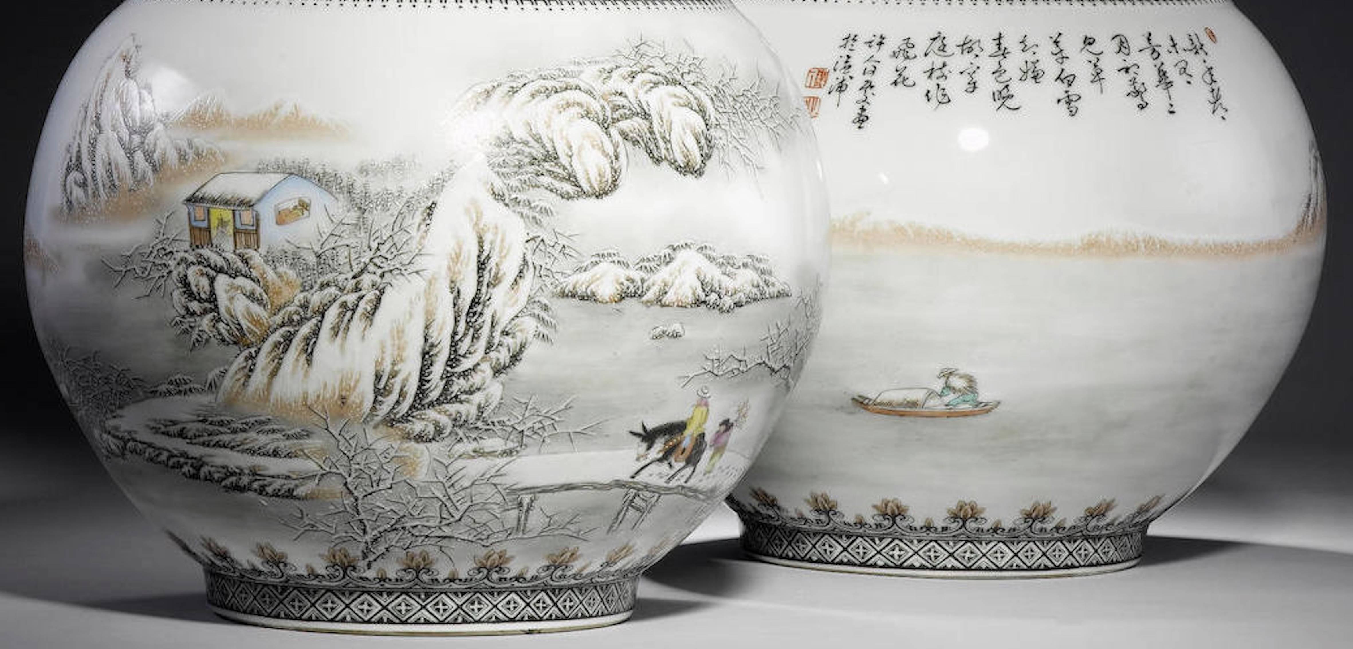 A pair of bottle vases He Xuren (1882-1940). Each painted around the body with a winter landscape scene depicting snow-capped pavilions, pine trees and mountains, the reverse with an inscription, signed Xuren, with three seals, the bases with Xuren
