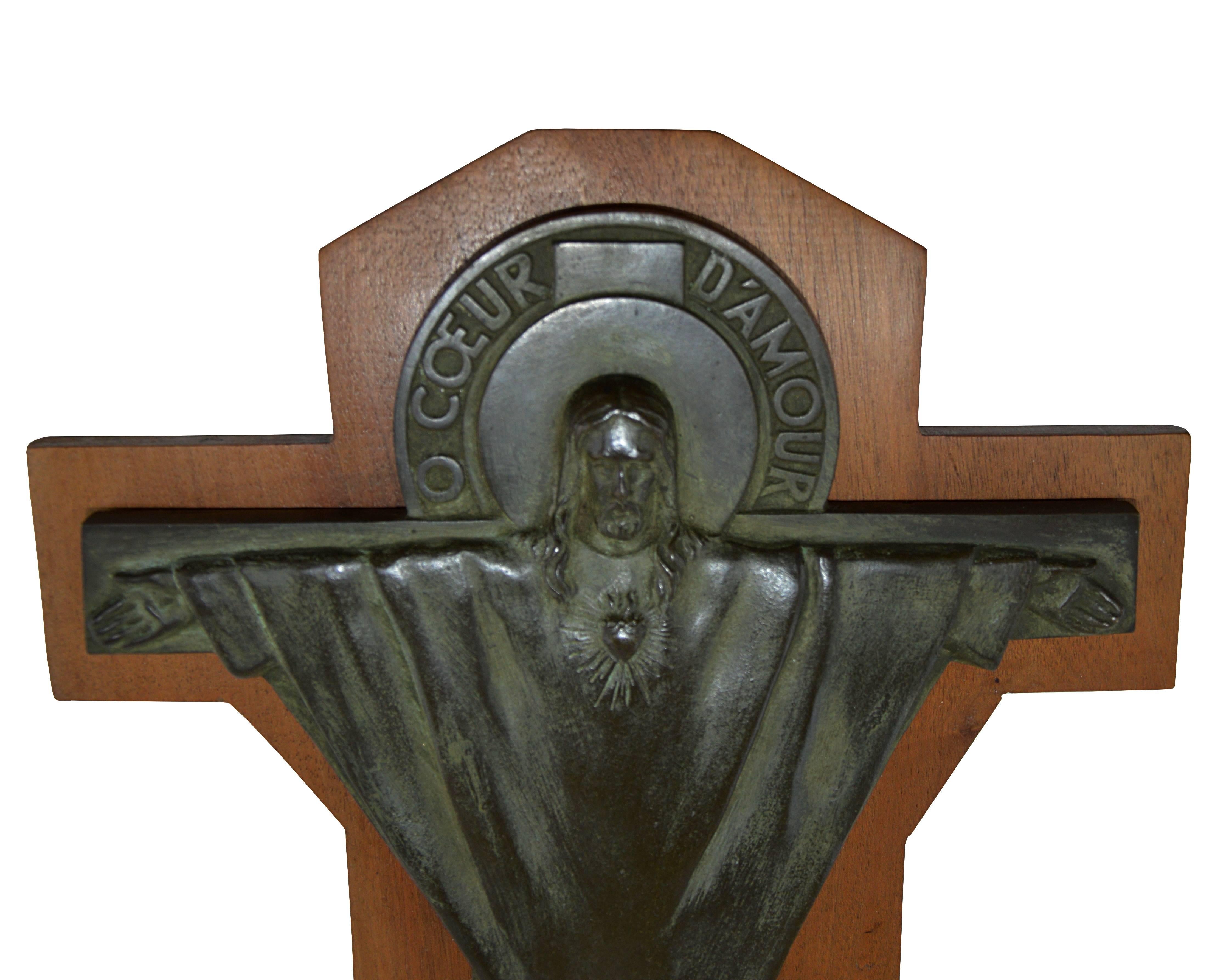 French Art Deco crucifix by Jeanne Ferrer, France, circa 1930. Bronze and wood. O Coeur d'Amour, Je Me Fie A Vous. Measure: Height 11.8