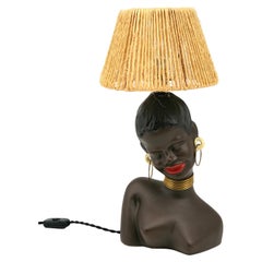 French Ceramic Black Woman Figural Table Lamp, 1950s