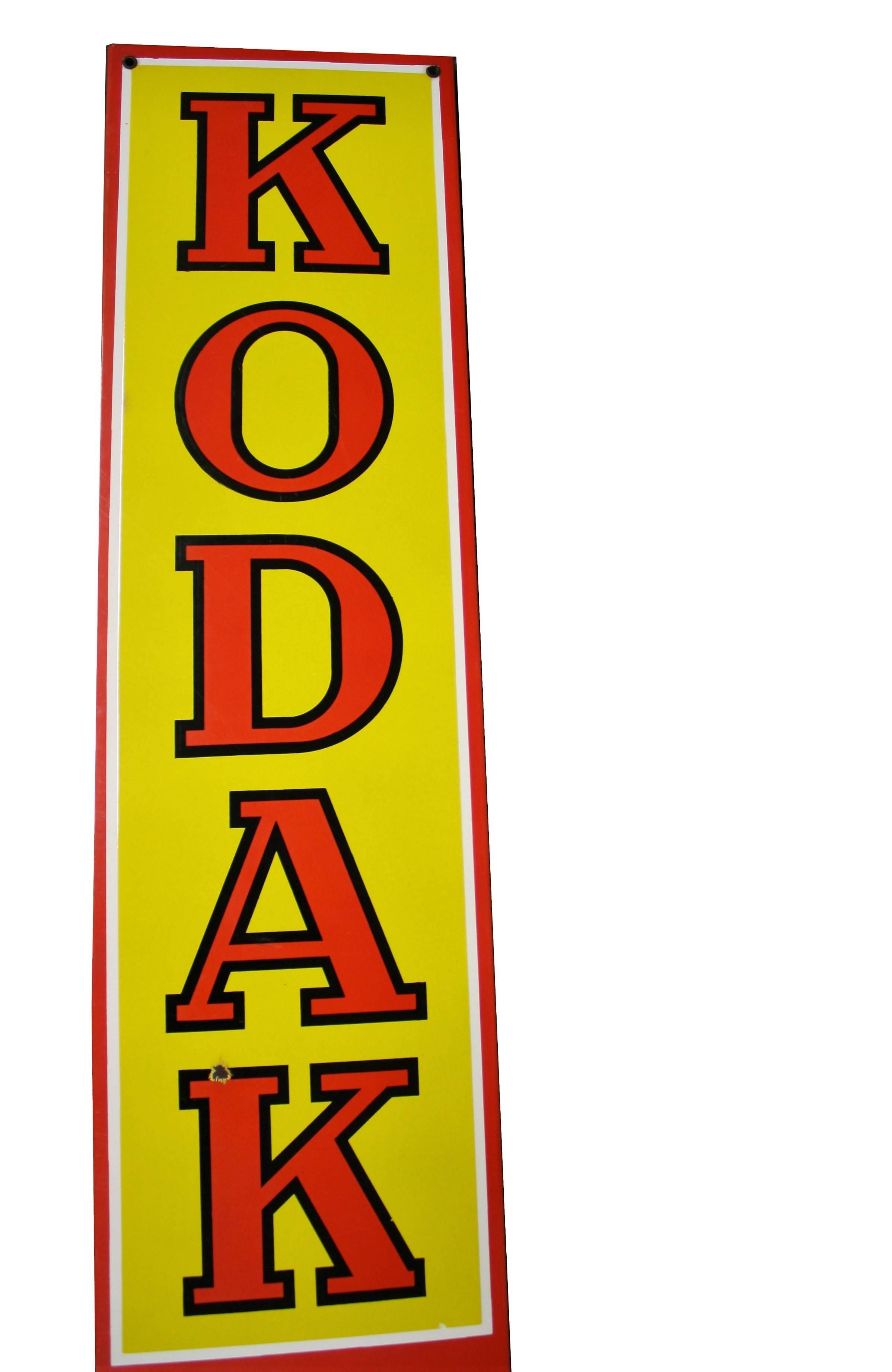 Vintage porcelain/enamel advertising sign 'Kodak'.

These signs where a common sight above local stores in villages and towns.

Kodak was very revolutionary at that time and a lot of advertising was done by this brand.

The famous red and