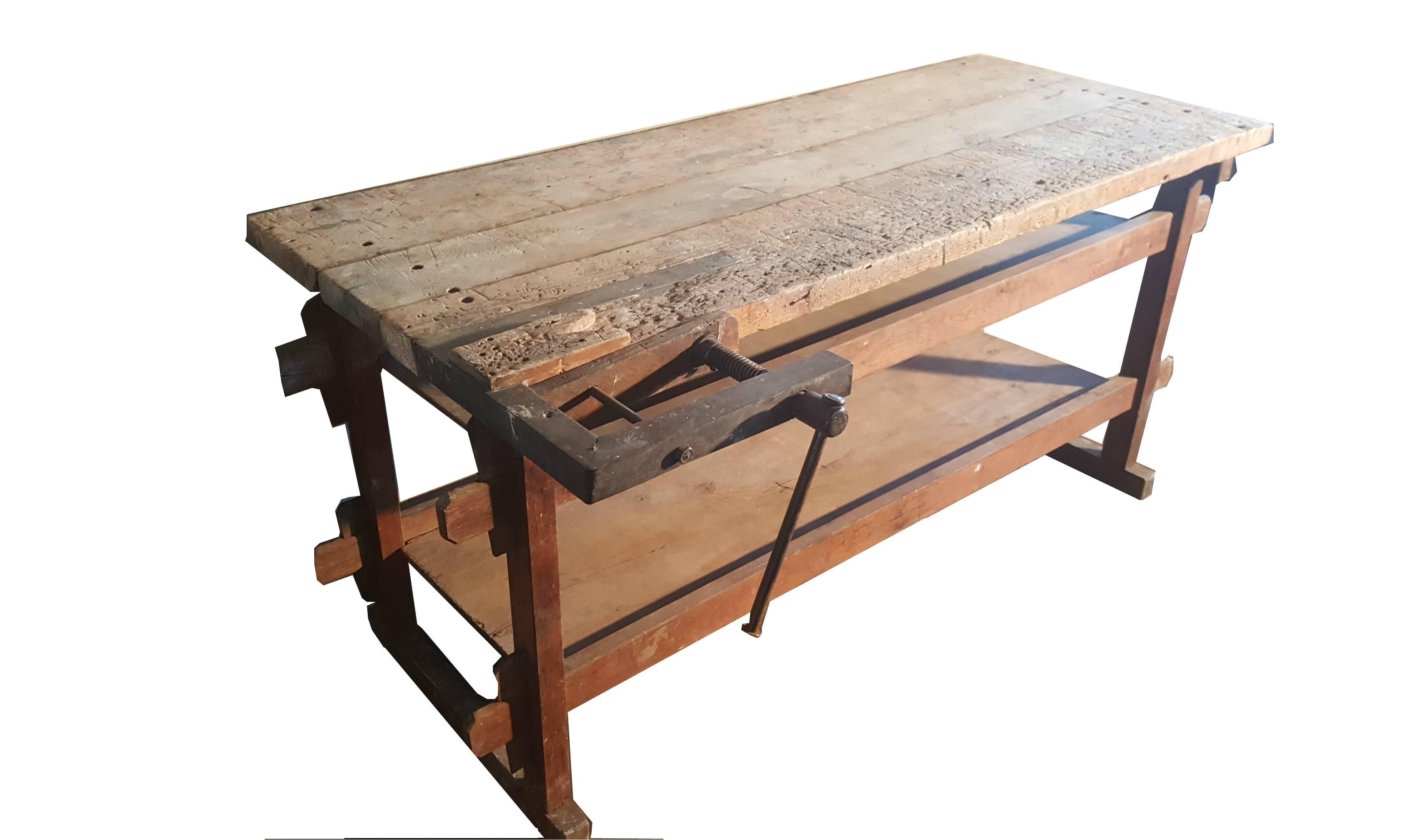 Early 20th century maple or carpenters work bench with a cast iron vise.

The table is in a charming used condition and has a good size.

It could make a creative kitchen prep table or desk. 

Measures: Height 120cm
Width 175cm
Depth