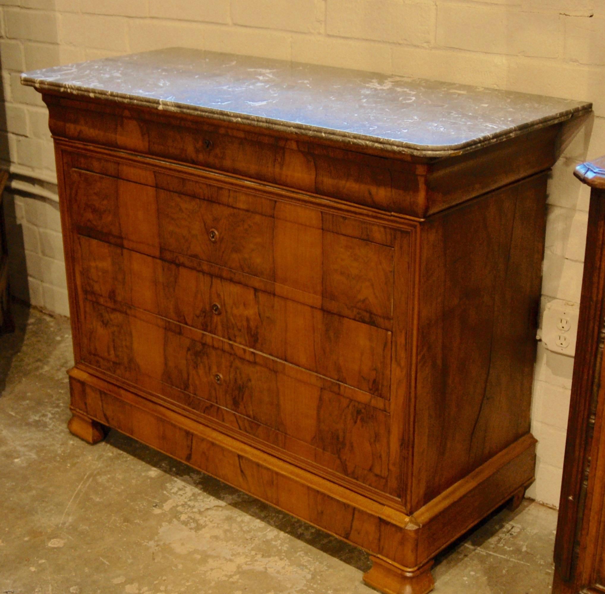 Burl walnut commode with original marble top and keys. Bottom apron is a secret drawer.