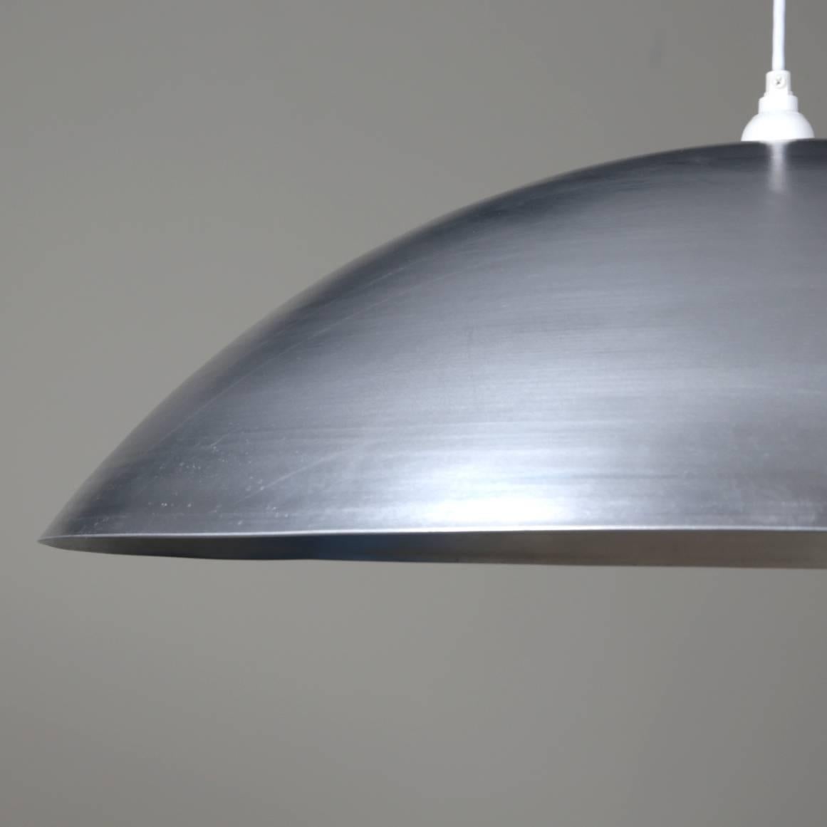 This listing is for 1x Industry Pendant in Waxed Aluminum by RESEARCH Lighting. We can customize the color to almost any RAL color.

Materials: Aluminum
Finish: Exterior & interior is powder coated in dark blue
Electronics: 1x E26 Socket, G40 Bulb