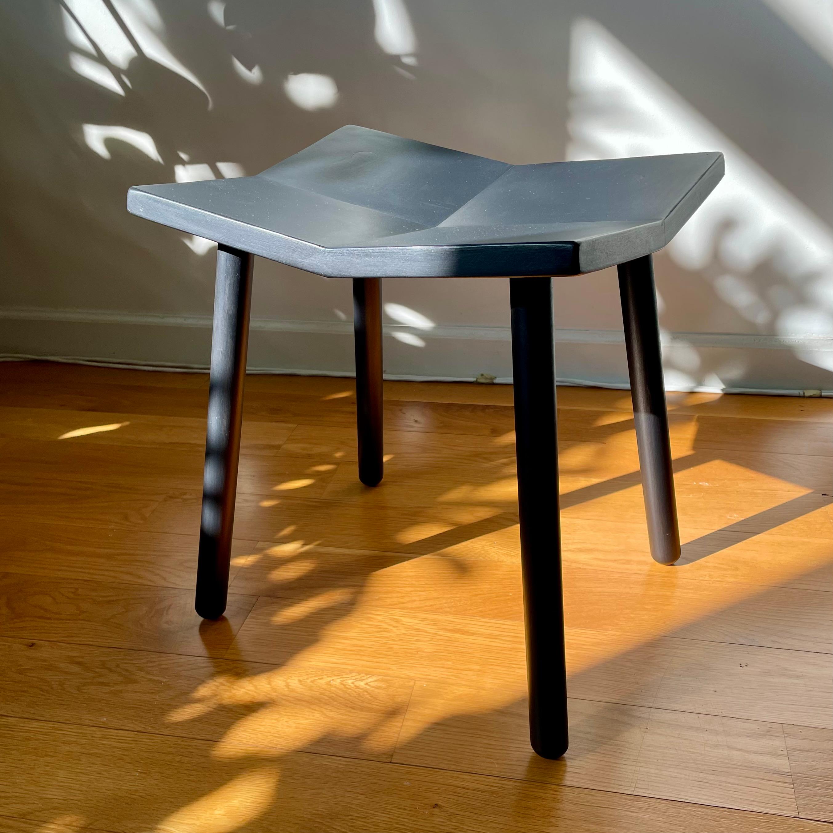 This listing is for 1x Mitre Stool by Souda with a painted black finish. These are floor models with slight imperfections (examples of which are shown in the image). I have a few available so you may receive a different one than the photo.

Each of