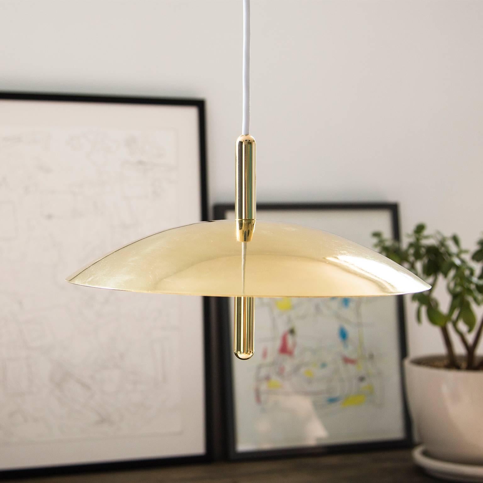 Utilizing warm LEDs and indirect light, signal pendants hover above any interior like a celestial body emitting a comforting glow. Consisting of a spun metal shade pierced by a polished central stem, the signal pendant is minimal and expressive.