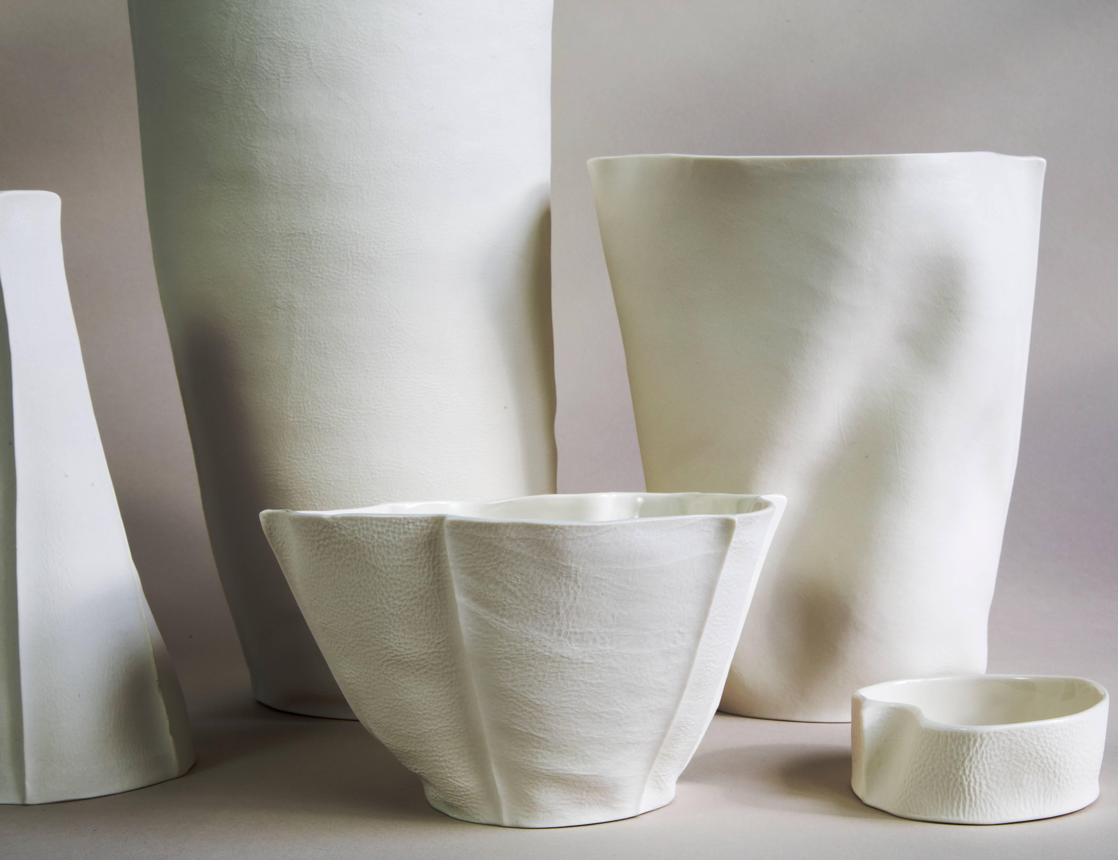 This listing is for a set of five pieces from the Kawa Porcelain series designed/made by Souda's Co-Owner, Luft Tanaka. Each piece has been made by casting liquid porcelain into a molds made entirely of leather. This highly-unique casting method