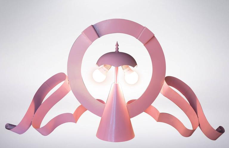 Soft pink lacquered metal Prototype realized in 1969, prior to series put into production during the 1970s for Gruppo UFO and Studio Alchimia. Hence making it a rare early prototype.

On the base of the lamp there is a 