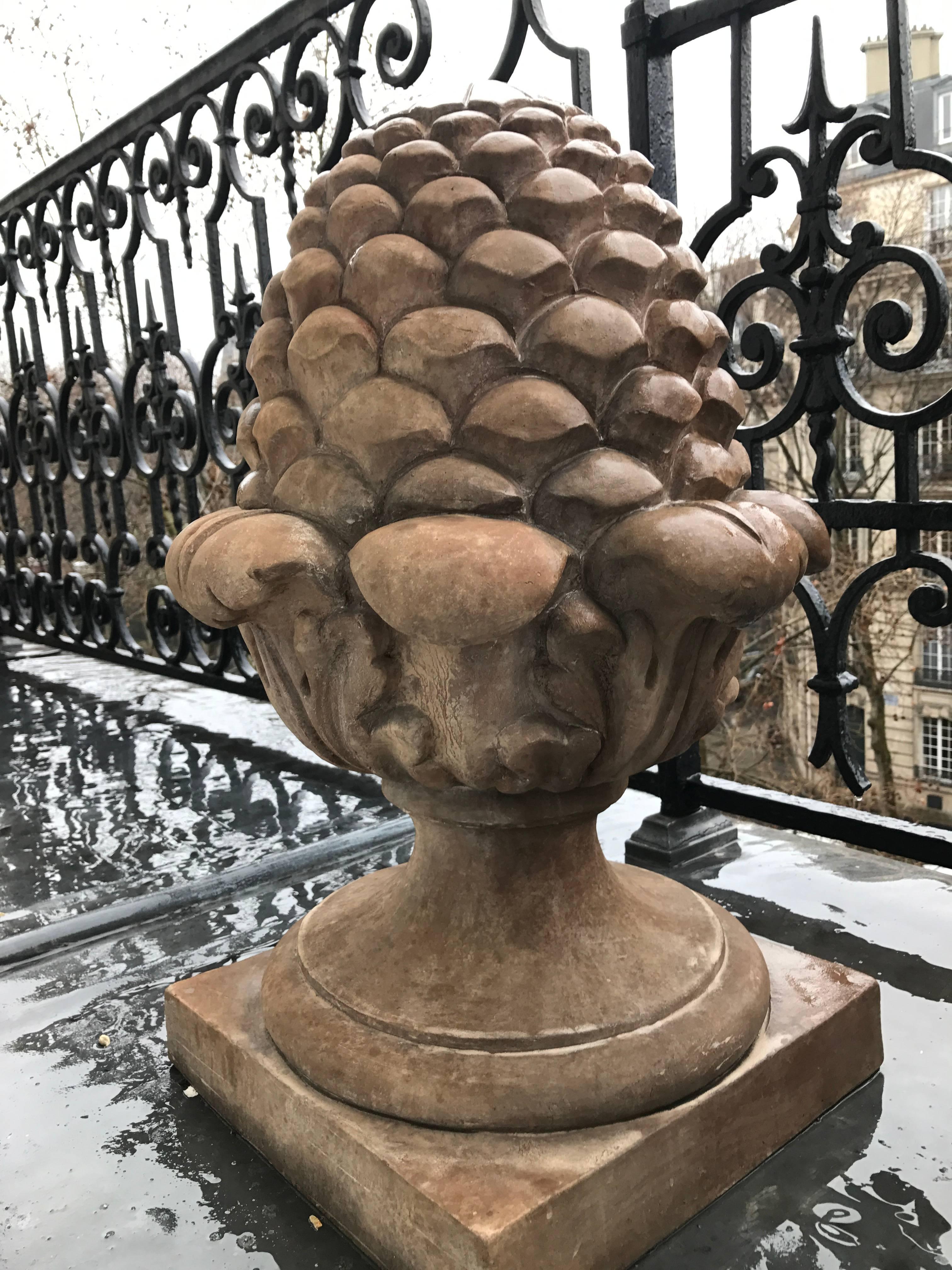 Pine cone in terracotta H 63 x 34 34 cm
The pine cone is a classic element of architecture in the south of France and Italy. It is a symbol of vital power and fertility. It is also associated with the cult of Bacchus, the god of wine.