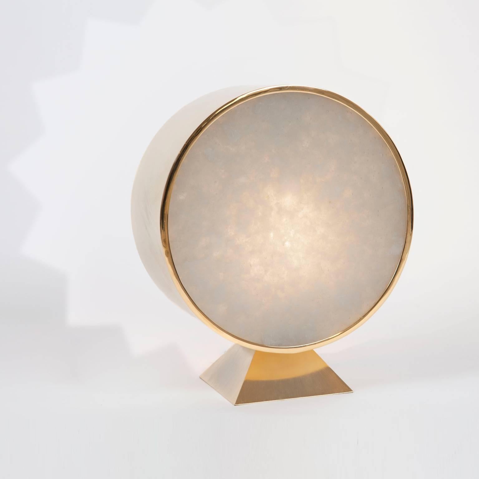 Table lamp in gold-plated gilt brass, clouded glass casted screen.
An adjustable sun pattern is projected on the wall behind the lamp when the switch is on.

Edition of 20. The pieces are signed and numbered.

About MuSigma:

Wonderfull moonscape or