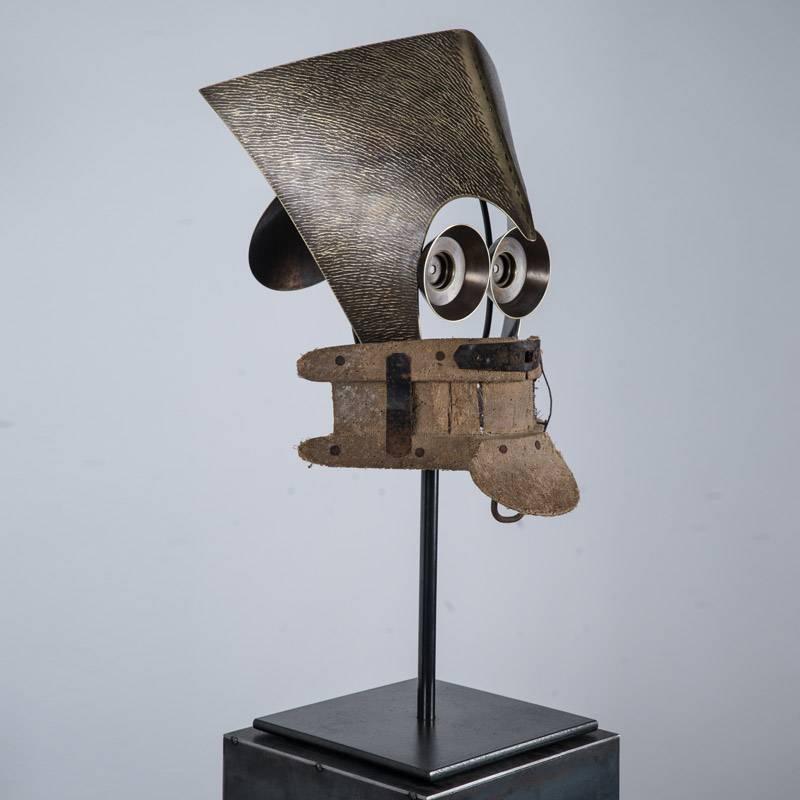 Tribal Mask “Autoportrait” by Elie Hirsch.
Patinated bronze, brass, iron and wood.
One-of-a-kind edition, signed and numbered, delivered with a blackened steel pedestal
Dimensions W.37 x D.35 x H.62 cm (without pedestal)
Photo Lise Ritter.