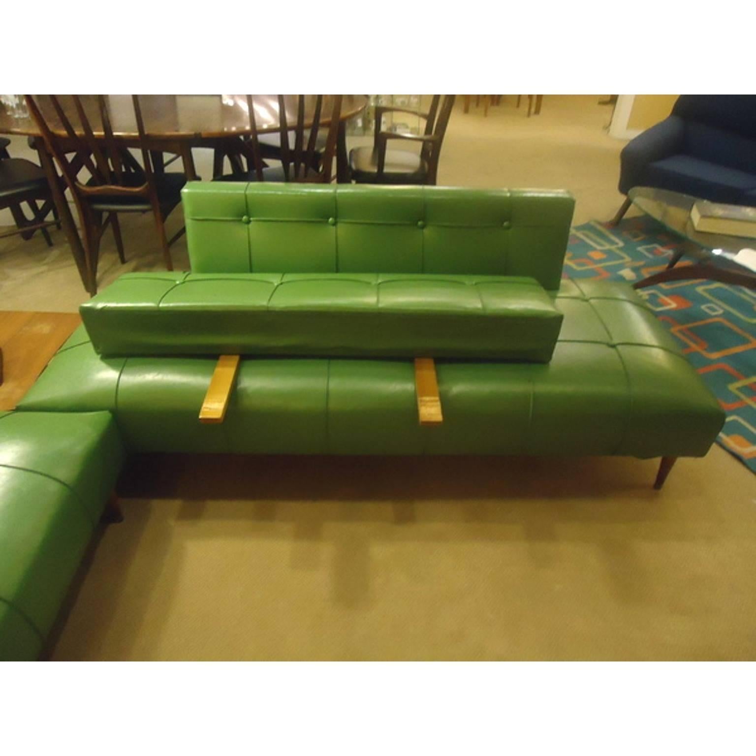 Great vintage daybeds.  Green Vinyl with a straw springs underneath.  These sofas are very comfortable.  They could be used in a spare room or a game room and then the backs could be removed for guests to sleep.  All in original condition with no