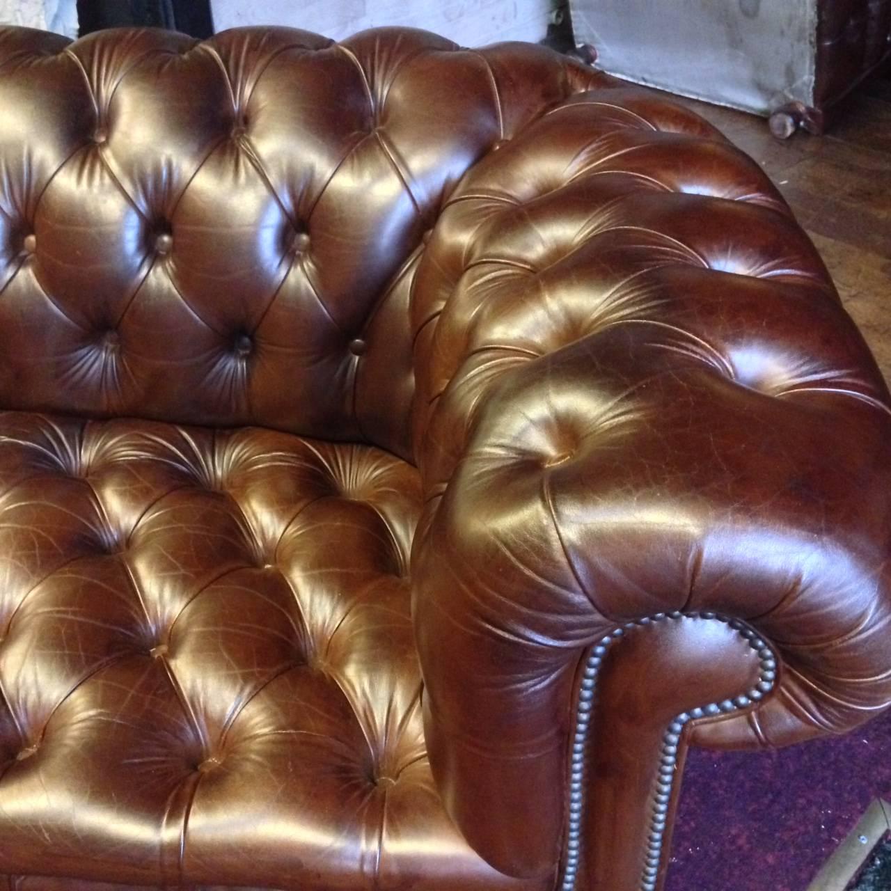 Very nice 1950s Chesterfield leather sofa. Very good condition. Two places.