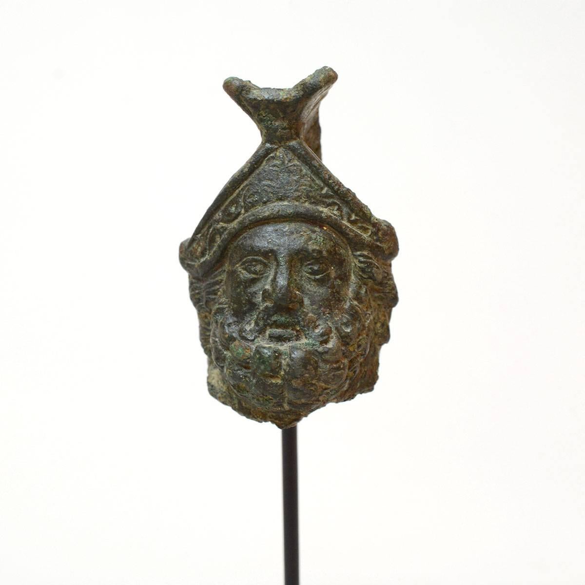 God of war and secret lover of the goddess of love, Venus, Mars (Greek: Ares) was a dominant figure in the pantheon of the militaristic Roman world. Due to its small size, it is likely that this head was once a full-bodied figurine, used as an