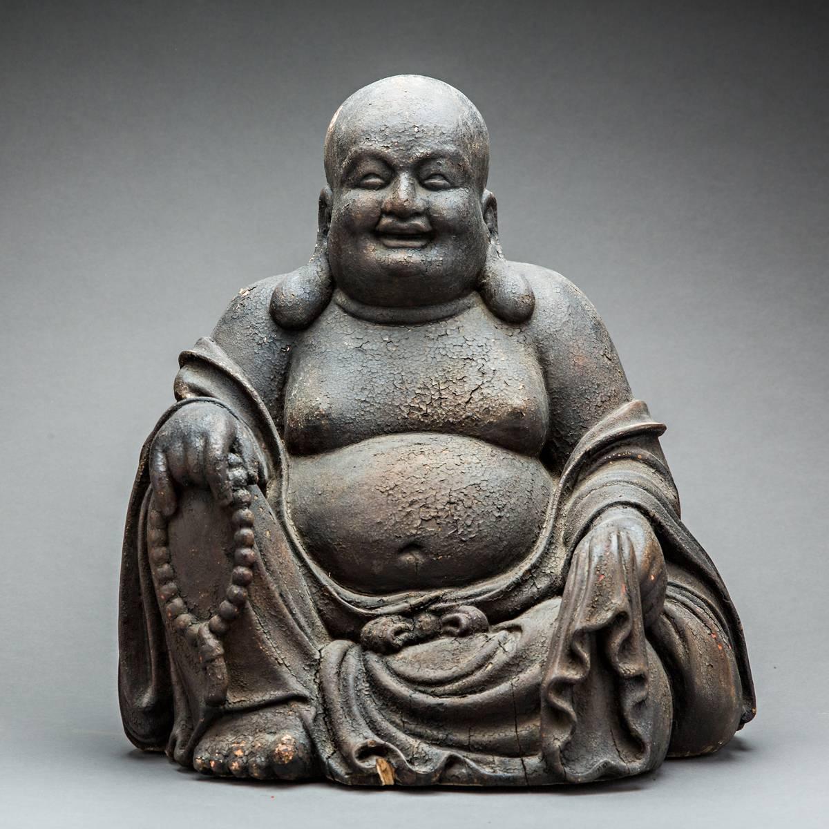 This rotund Buddha has considerable religious and historical significance to Buddhists and historians alike, as it is based upon a series of genuine and mythical personages from Chinese and Buddhist history. It dates to the Ming Dynasty, which ruled