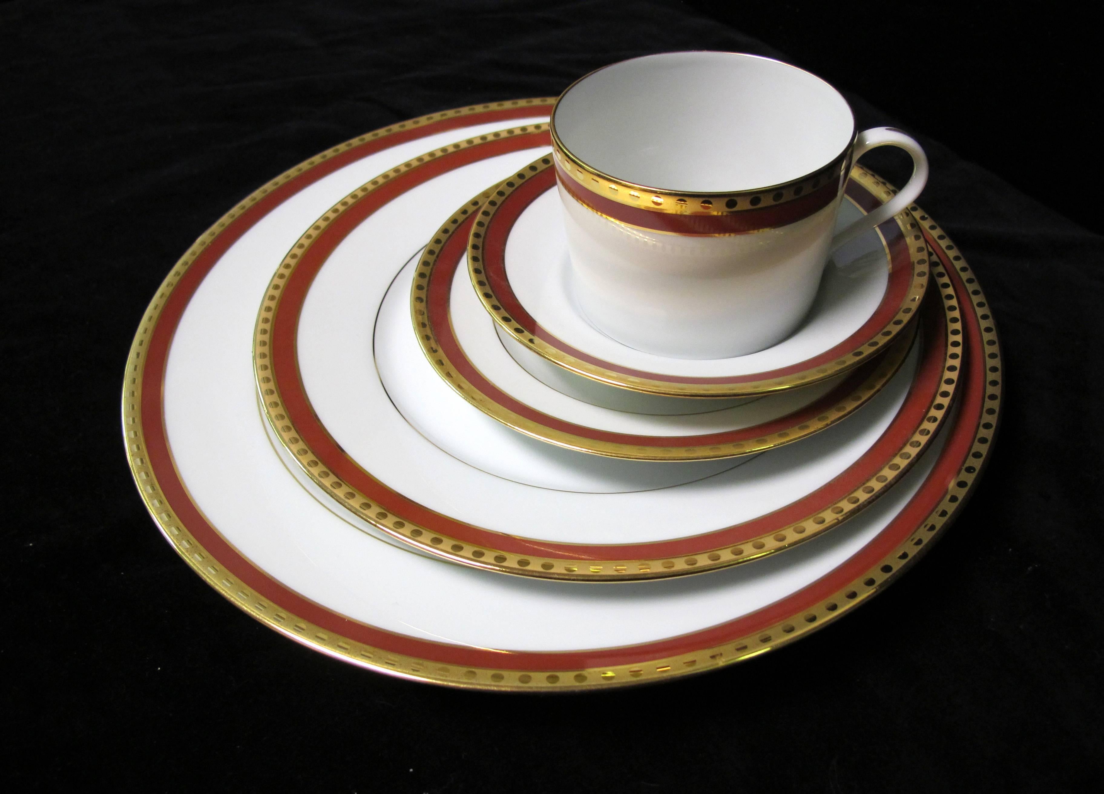 Tiffany & Co. rust band dinner set of five pieces.
There are two complete sets available. They are sold separately. If you are interested in both sets, please contact us.
From largest plate to smallest, the sizes are:
11