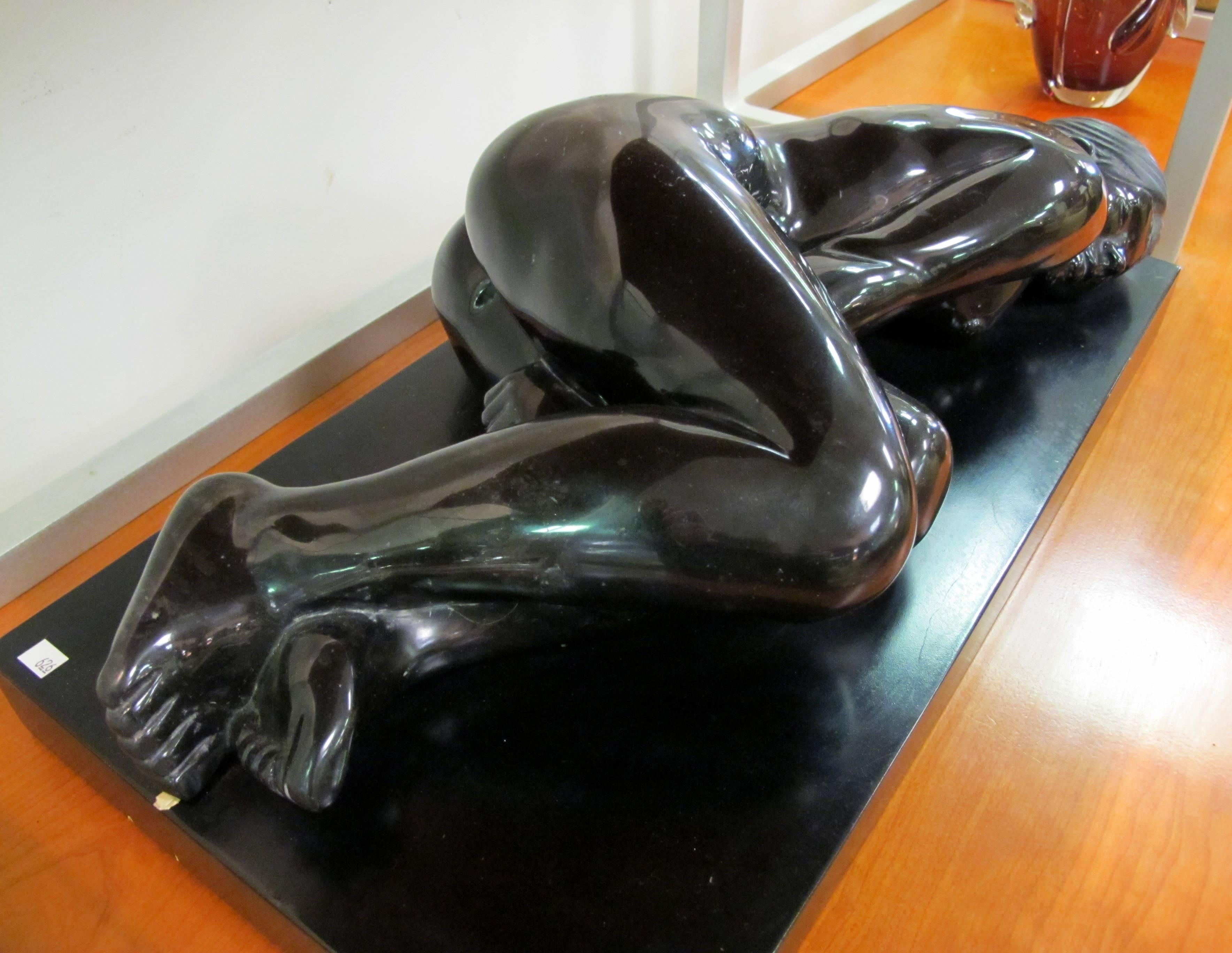 Black marble female figure by Mexican artist Gustavo Nequiz. Purchased in New Orleans, this beautiful sculpture is 7