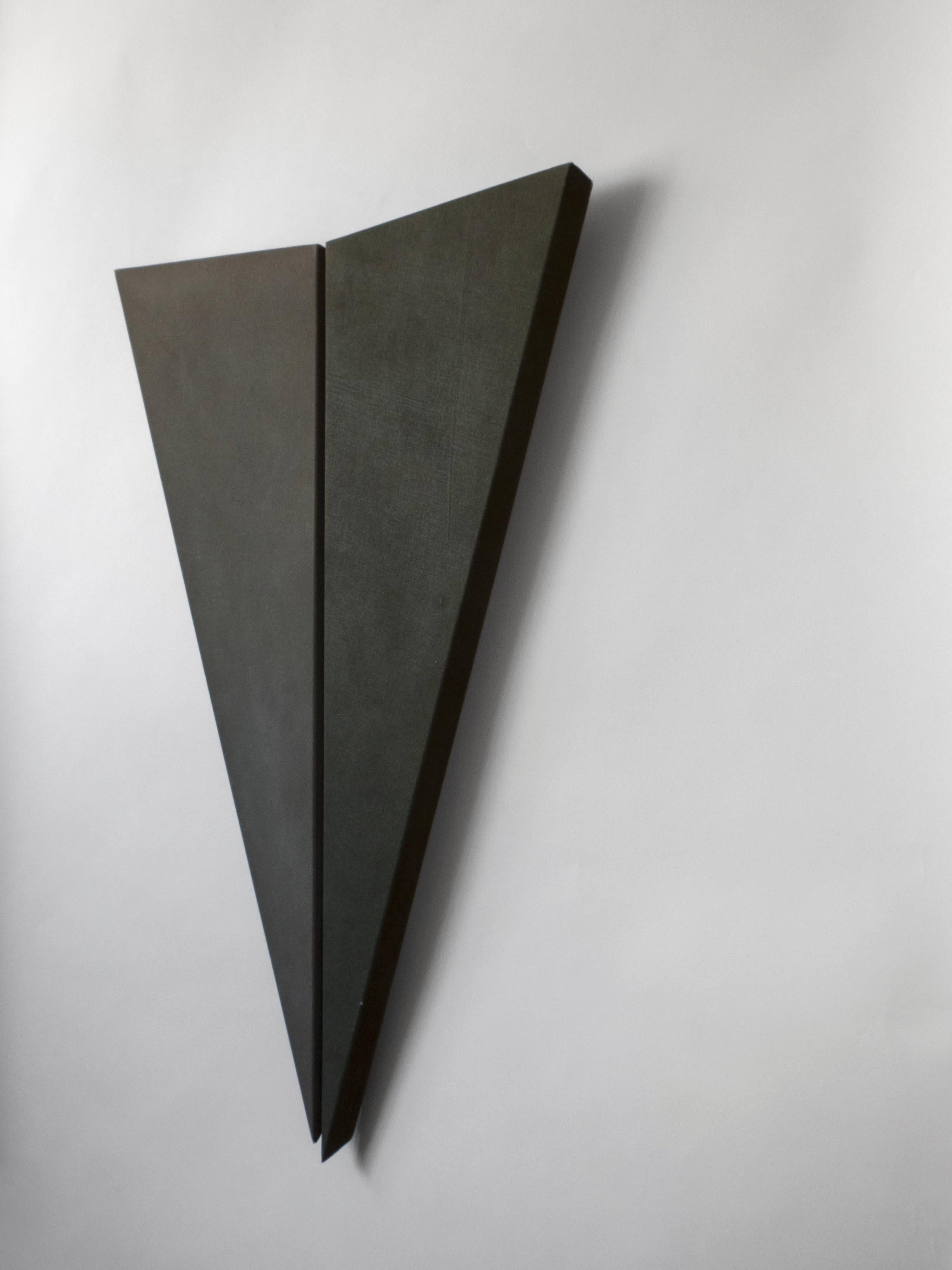 Two toned grey pigment on canvas, stretched over a geometric frame, vertically bisected. Signed on the reverse: Carl Magnus -83.
