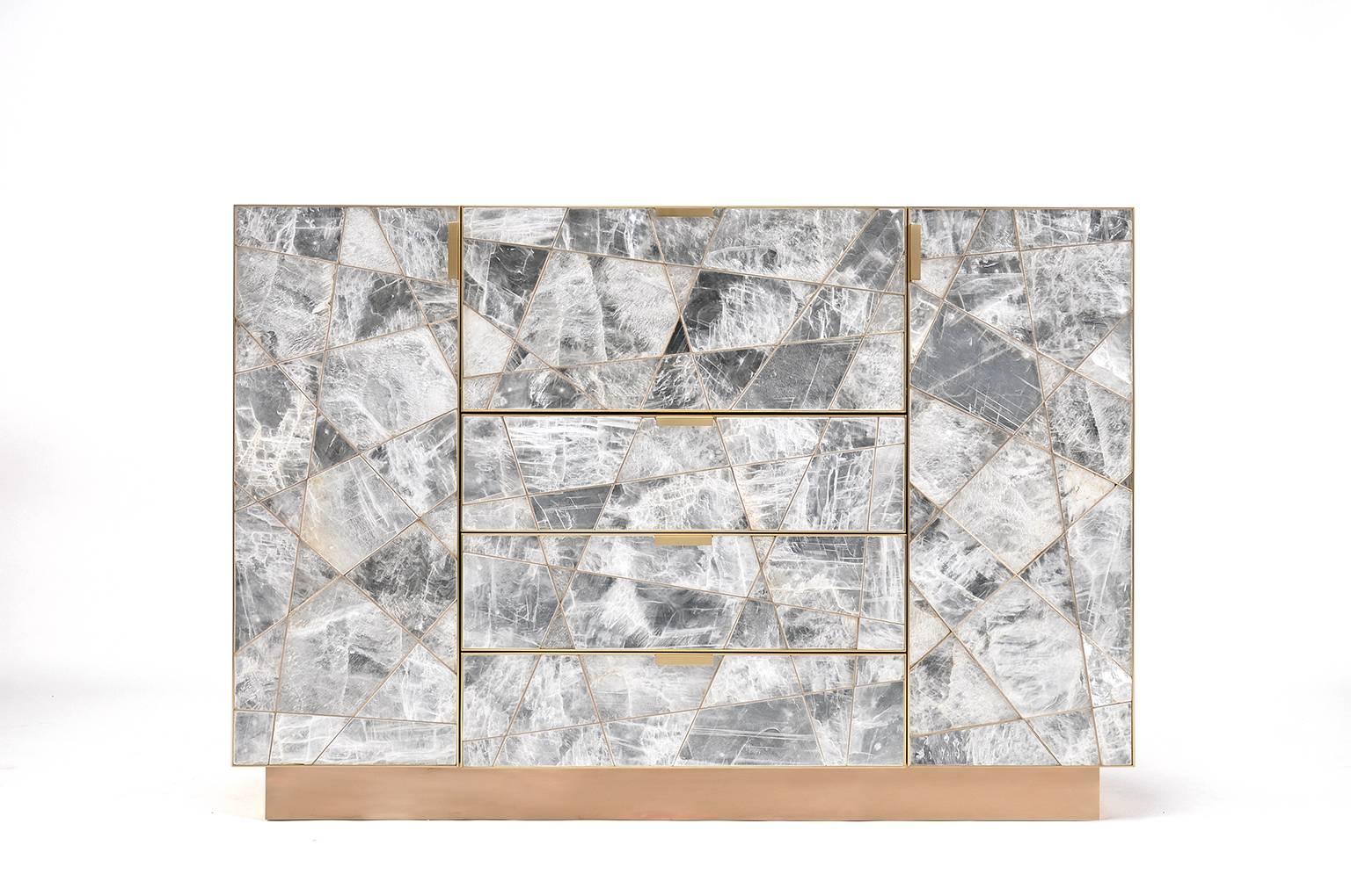 The Mosaic cabinet in selenite, bronze and claro walnut is a strikingly opulent example of a few of the most beautiful materials in the natural world that we have been given as furniture makers to work with. This particular Mosaic Cabinet is