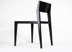 Armless Contemporary Ash Chair with Faceted Legs and Seat Back