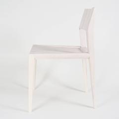 White Armless Contemporary Ash Chair with Faceted Legs and Seat Back