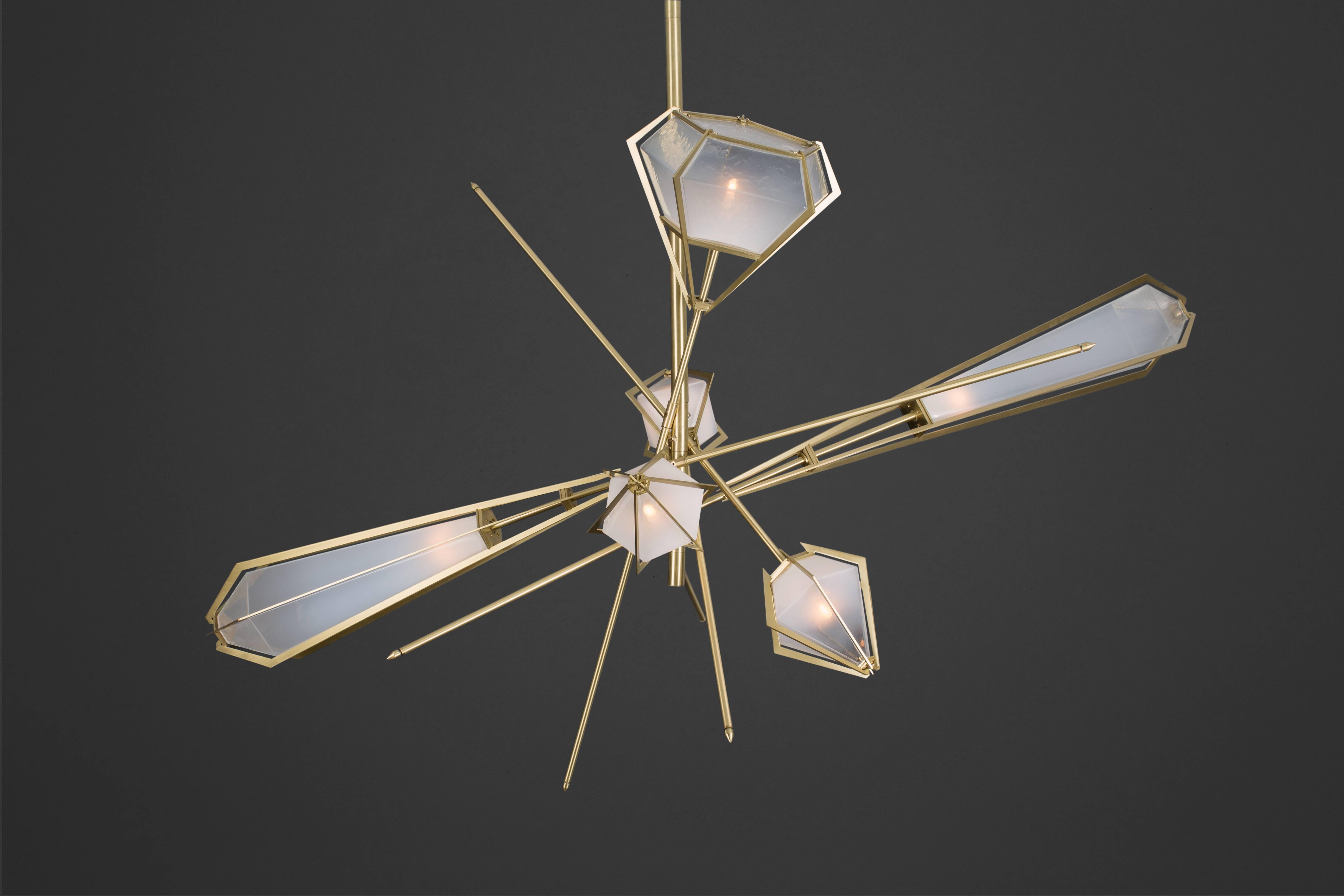 Elegant sculptural light-fixture inspired by jewelry design featuring a mould-blown glass gem in a chic metallic setting to create an asymmetrical starburst of light.

Harlow is available in various color ways, and held in a metallic frame