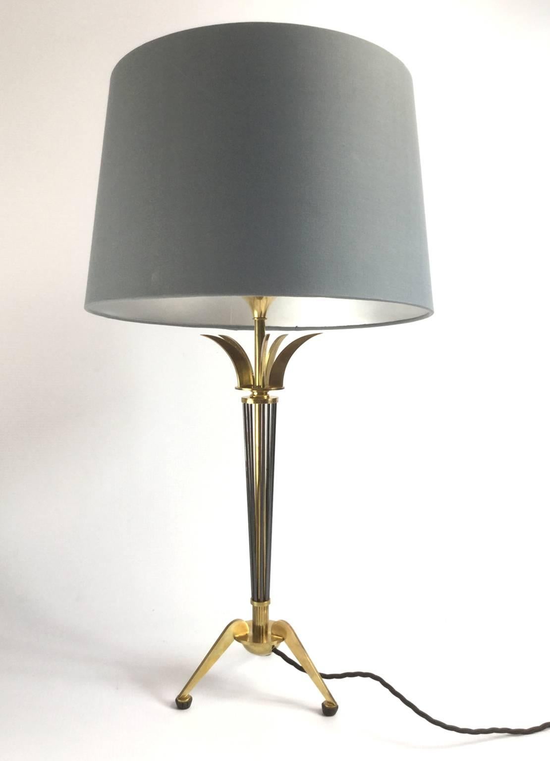 Brass and bronze 1950s table lamp attributed to Maison Jansen
Measurement without shade:
53 cm height
19 cm base width.

