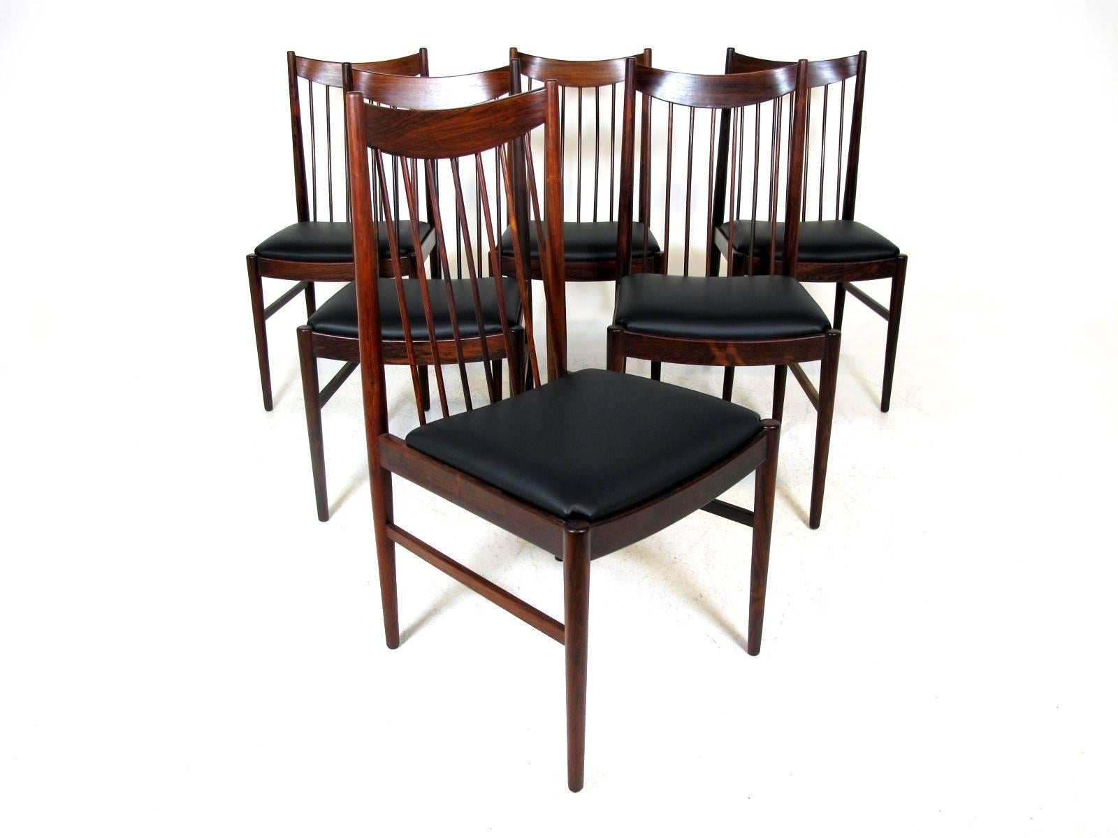 Beautiful set of six Scandinavian Modern high back dining chairs, model 422 designed by Arne Vodder for Sibast Furniture in 1964. New professional upholstery in black leather. Frames are in excellent vintage condition.