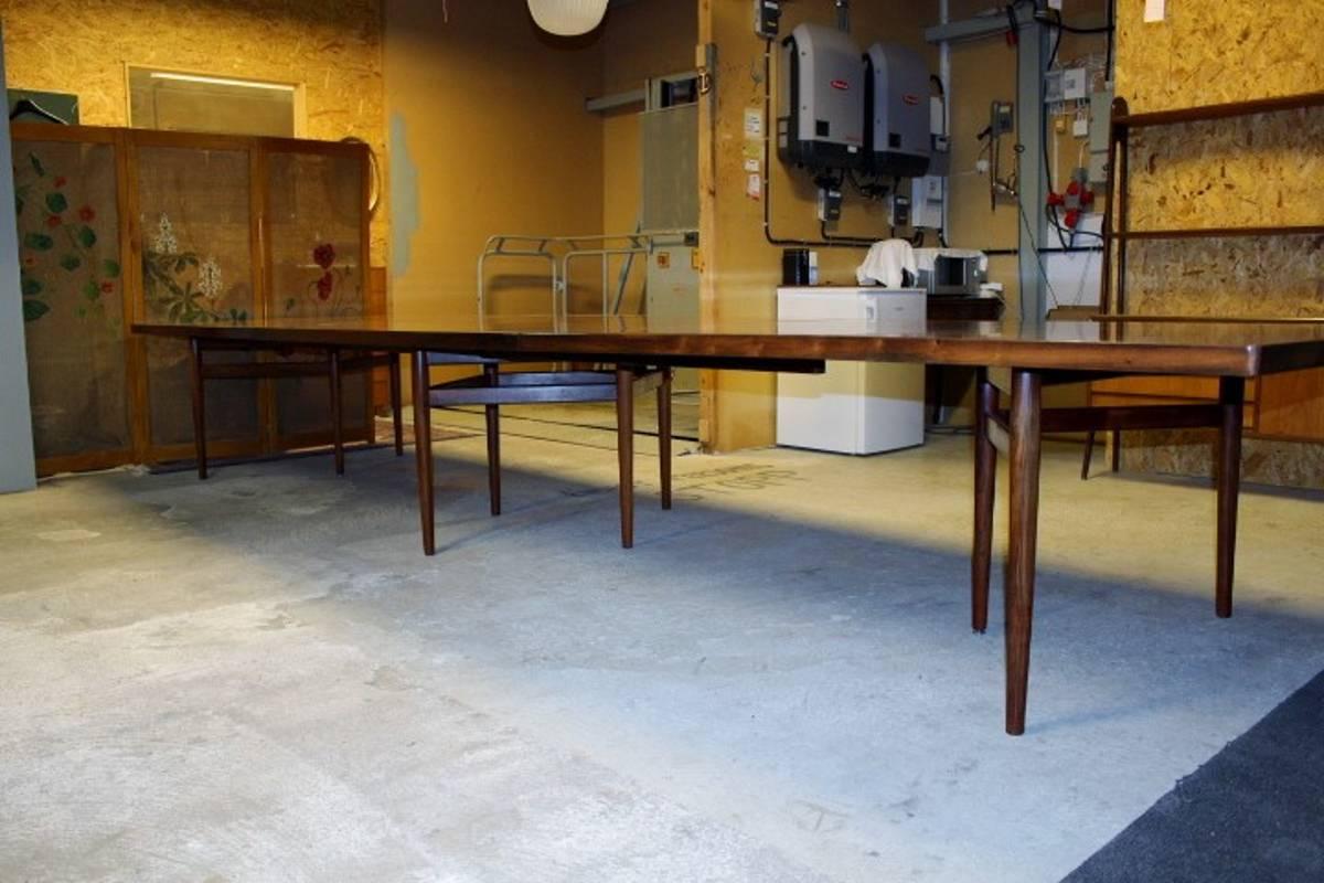 Very rare and big Arne Vodder Conference table in rosewood. Three parts with a total of ten tapered legs. Produced by Sibast Møbler, with maker's label.
Measures: W 494 cm, D 135/145 cm, H 72 cm.
This lot is only the table. See on our store front