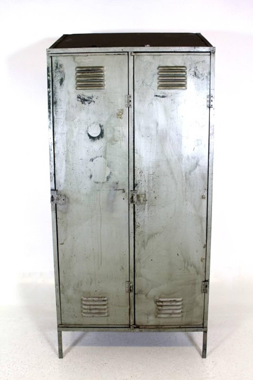 Gray Industrial locker. This vintage locker was used by workers in a factory in Sweden.
Today it is often used as a wardrobe.