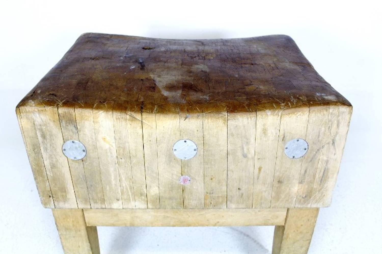 Late 20th Century Scandinavian Vintage Butchers Block with a Rich Distressed and Worn Finish