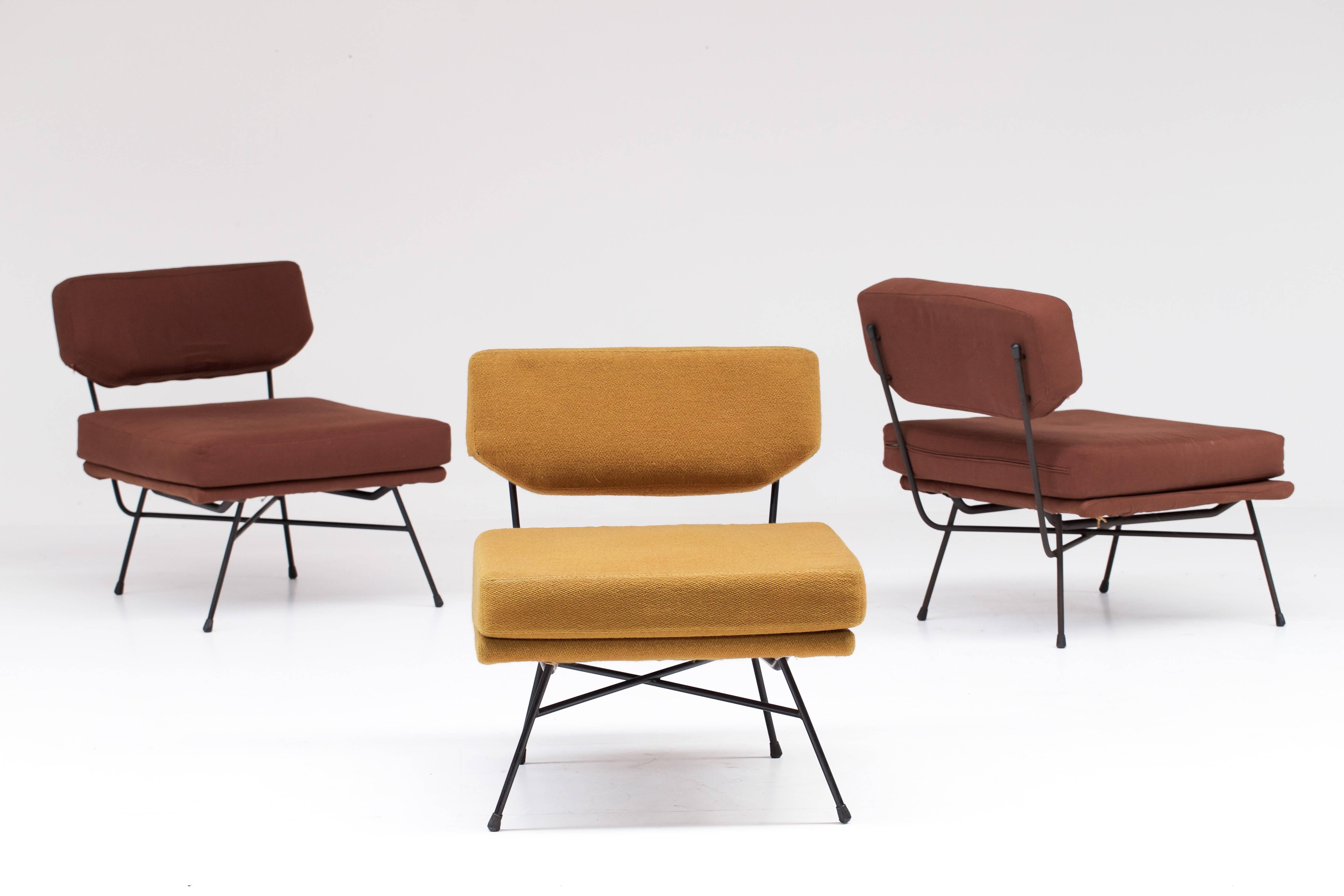 Four Elettra lounge chairs for Arflex, one still in original yellow upholstery with label. 3 brown reupholstered lounge chairs, of which 1 still has the original label.
These hard to find Studio BBPR lounge chairs come from a residence in Bologna.