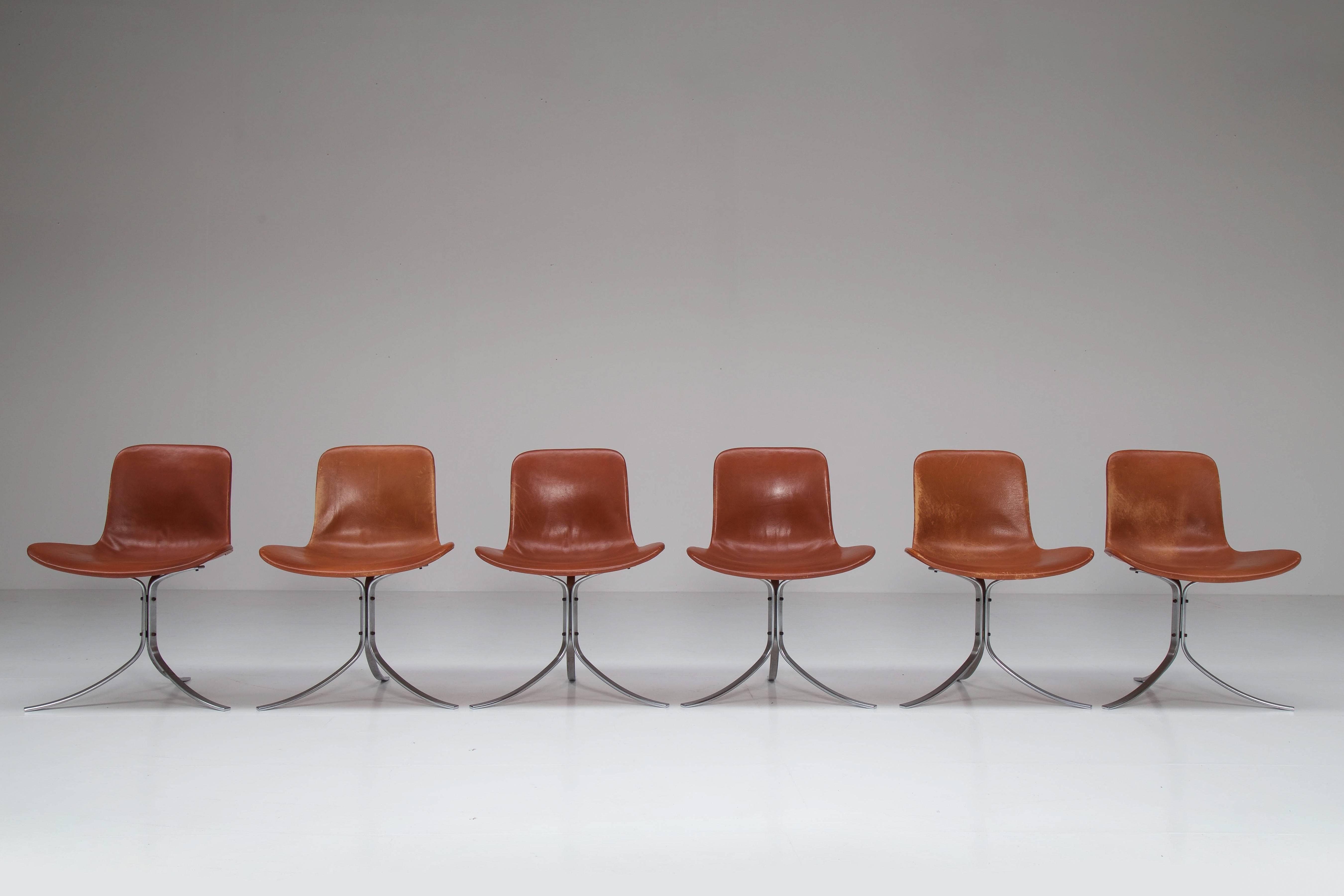 First edition PK9 chairs with fantastic patina, all stamped with the E. Kold Christensen logo. 
The chairs come from a holiday house at the Belgian coast, purchased by us together with a PK54 table. Photos from the original set up are