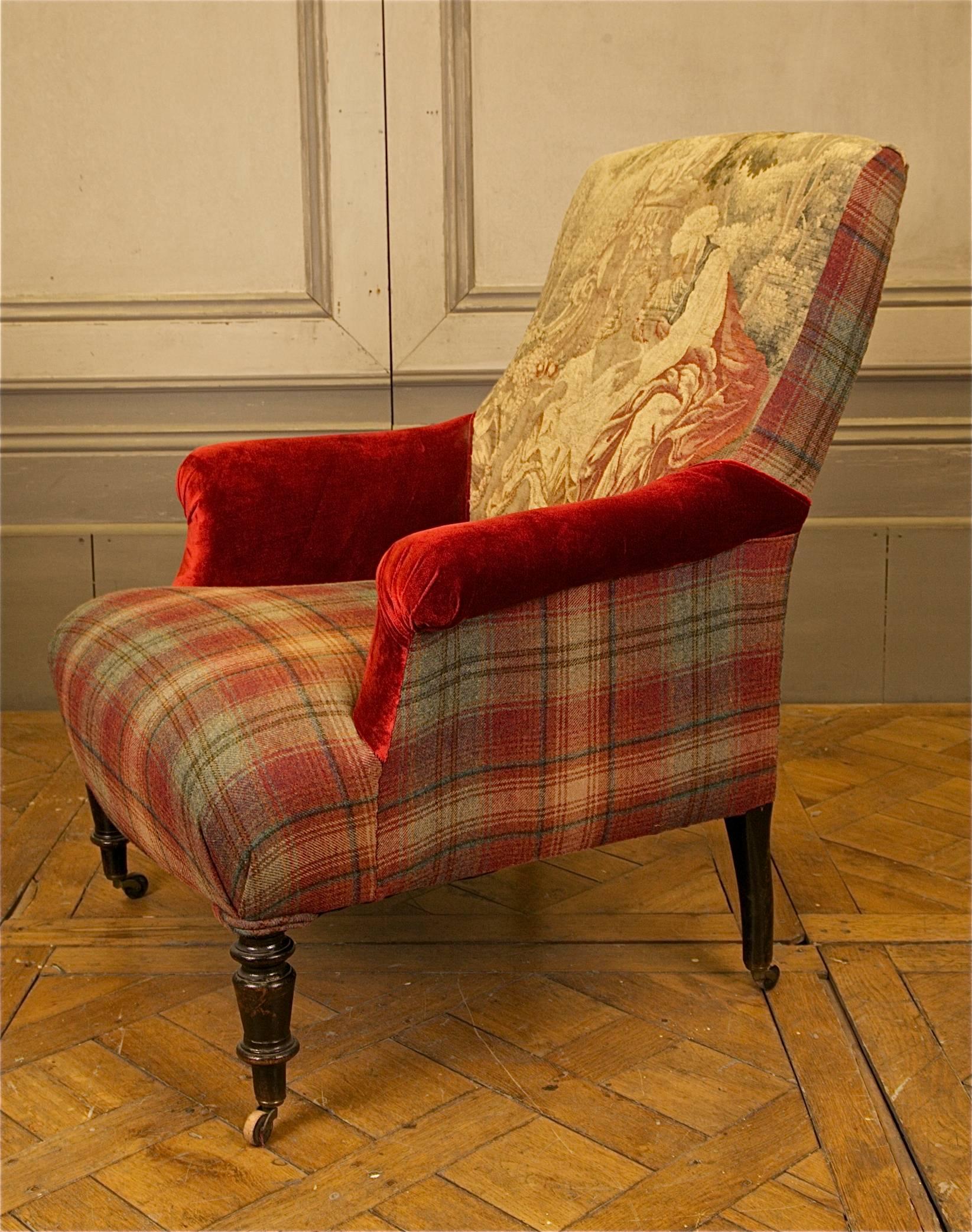 French, Napoleon III period armchair re-upholstered in the patchwork style using an 18th century Aubusson tapisserie displaying a romantic setting on the backrest along with red silk velvet and tartan fabric.