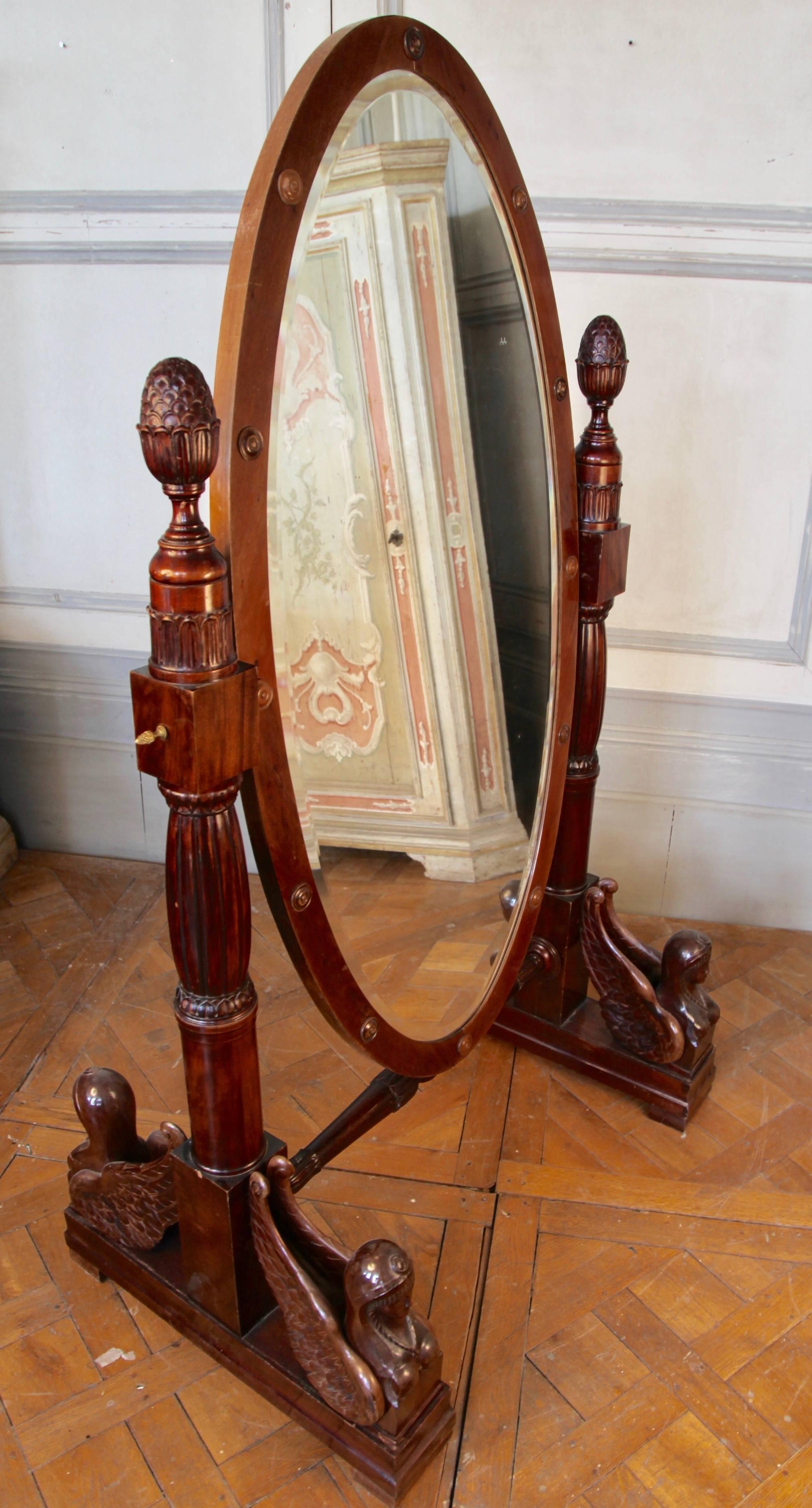 An elegant and imposing, 19th century, Italian cheval mirror made in solid mahogany. Belonged to a well known Italian actress of the golden age of cinema.