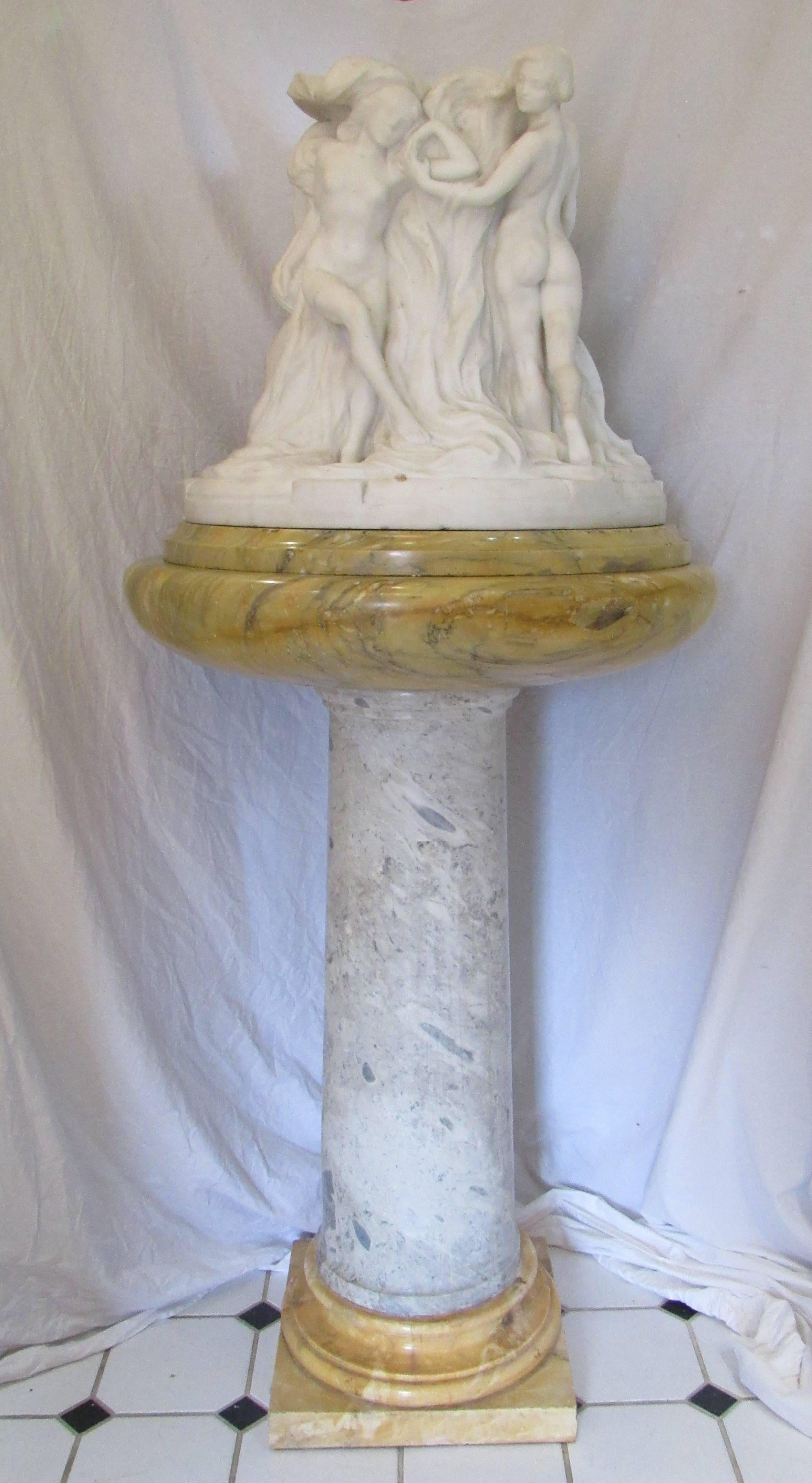 Beautiful Art Deco Italian marble carving of dancing nymphs on pedestal. Hollow vase interior with five dancing nudes surrounding. 30
