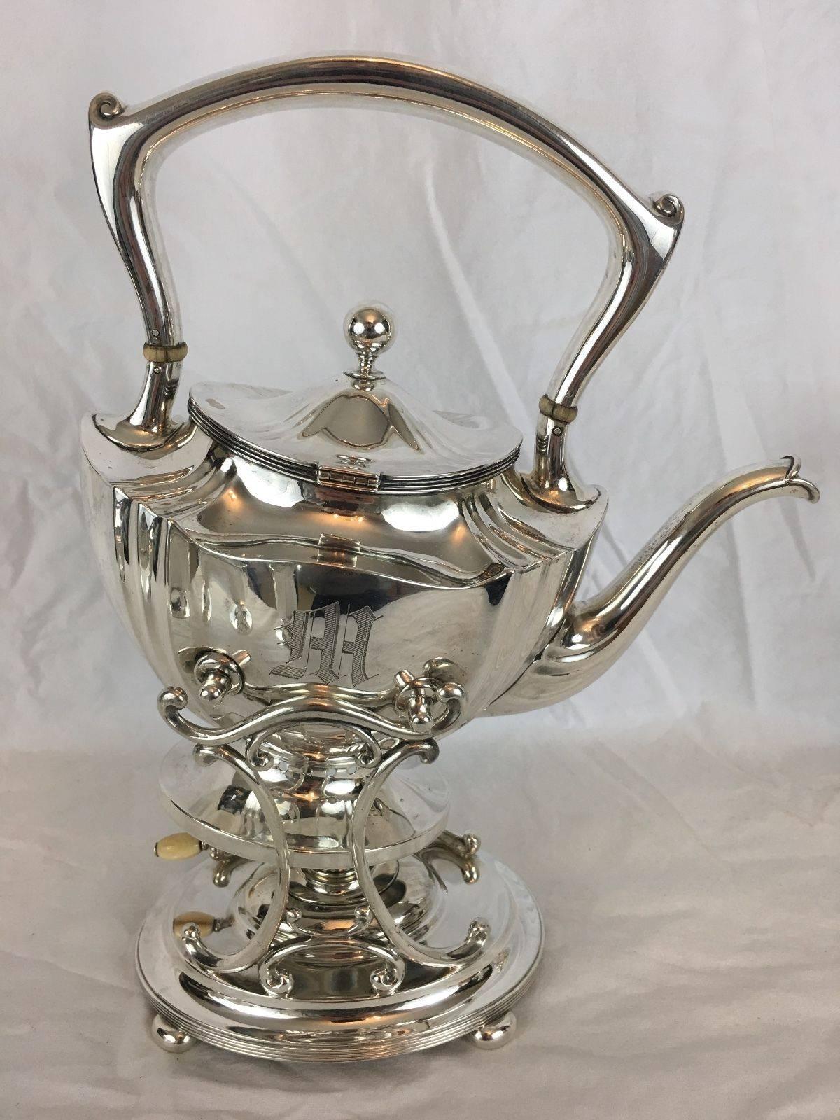Tea and coffee service by Whiting Manufacturing Company of Massachusetts, circa 1900 

Pattern number 6950S 

Clean and neat ribbed form 

Sterling silver

Measures: Hot water kettle on stand with burner - 12