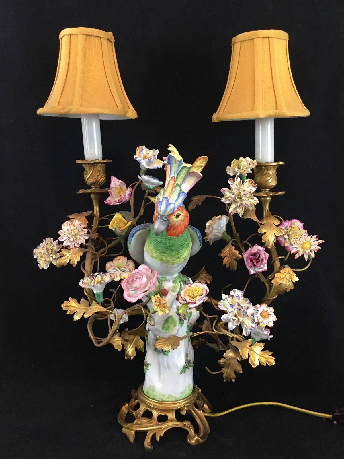 Pair of beautiful lamp converted candelabra with porcelain parrots and flowers 

Brass fittings

German or French 

circa 1890 

Both have crossed arrows blue underglazed marks 

Condition is very good. The parrots are in perfect condition