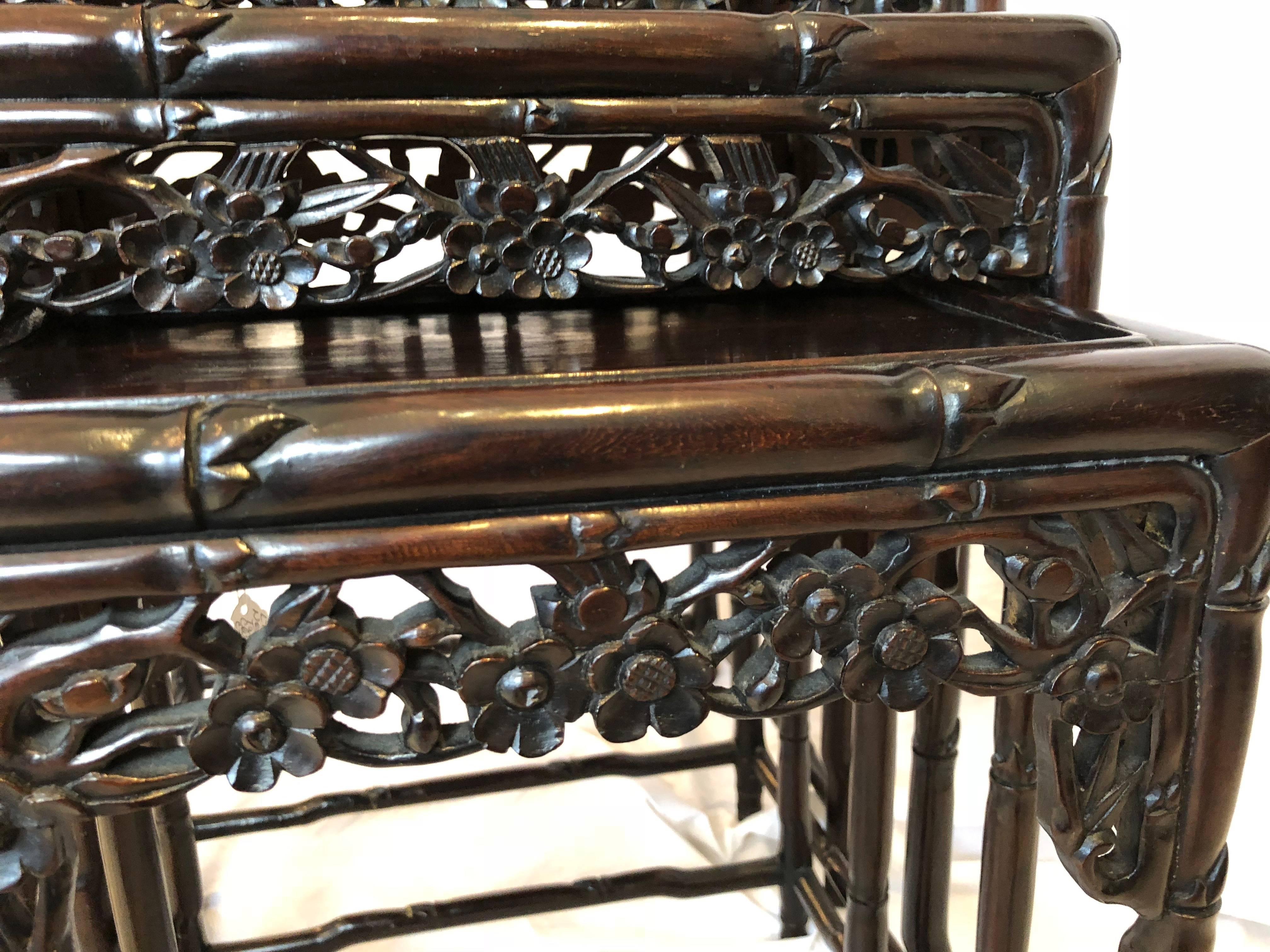 Four Chinese Rosewood Nesting Tables, circa 1920, Floral Motif In Good Condition In Seattle, WA