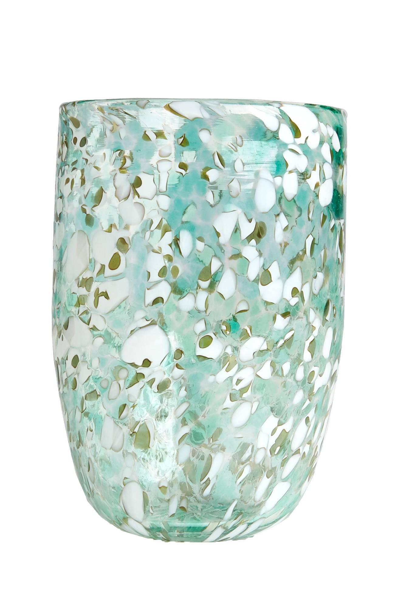 These glasses are made from pale transparent greens, yellows and blue hues and white with a marbleized effect. They are made in Venice.
Designed by Laguna B exclusively for Cabana. 

Each set consists of six glasses and they can be ordered in any