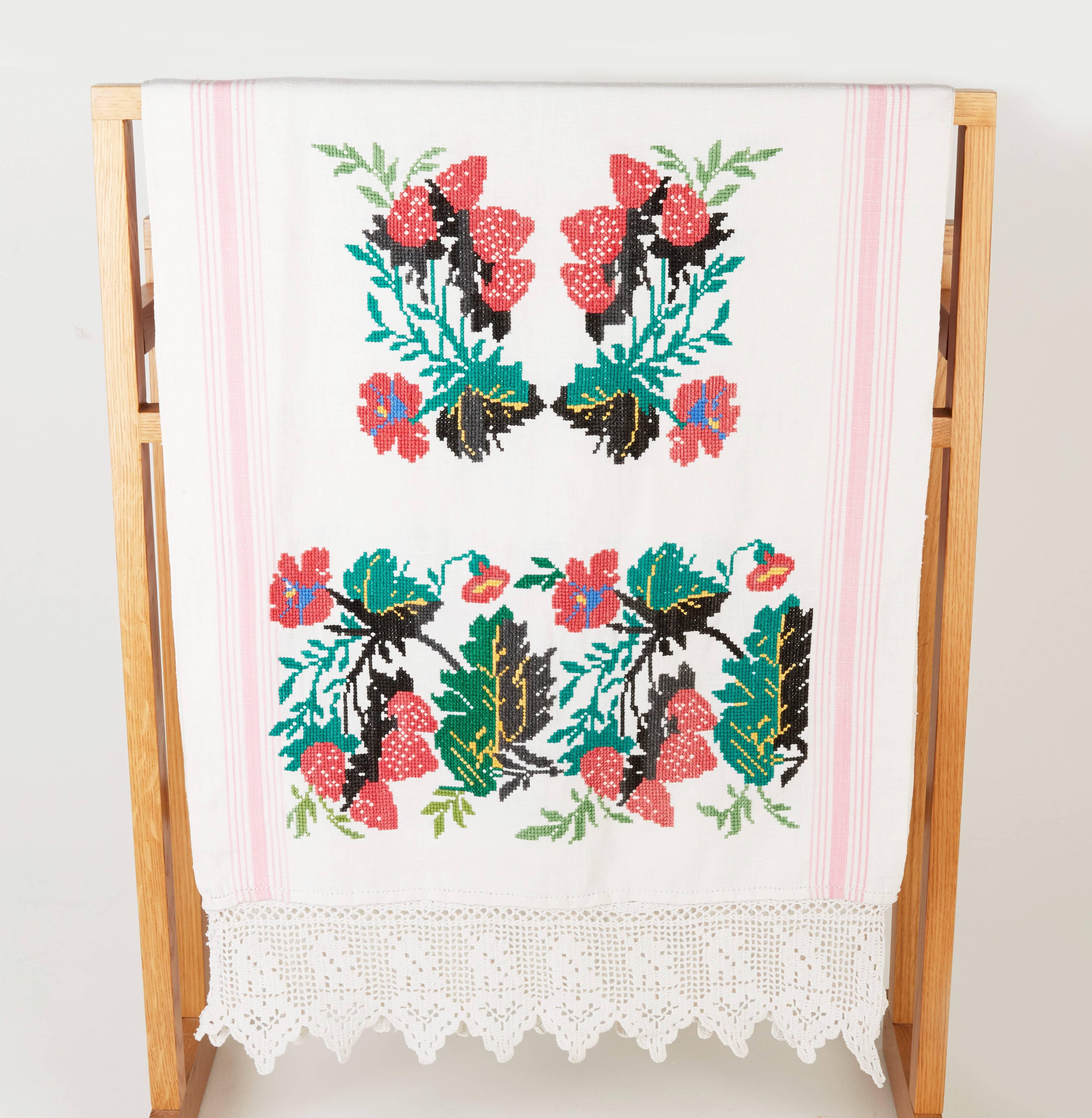 Vintage Ukrainian embroidered Rushnyk. The Rushnyk is an embroidered cloth used both for decorative and ceremonial purposes. The ritual cloth in Ukraine is meant to accompany a person throughout their life, and played a prominent role in all stages
