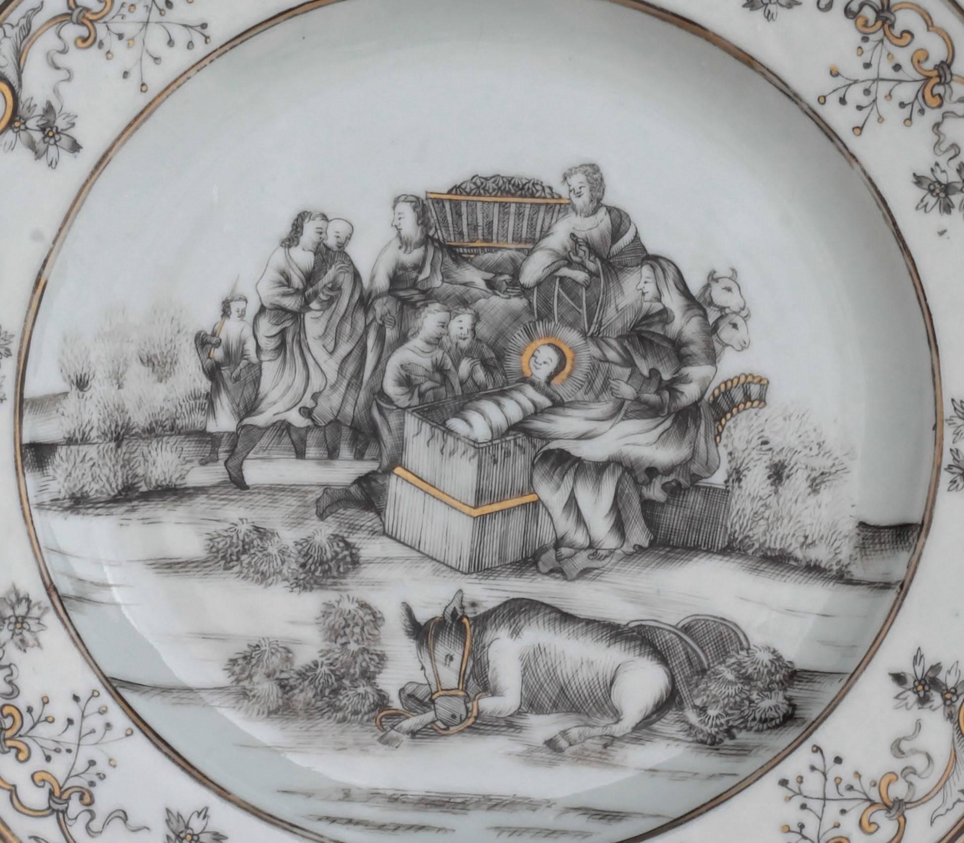 A China porcelain plate with grey and gold decoration representing the Christmas.
Qianlong period (1736-1795), 18th century.
Measures: Diameter 22.8 cm.
Chip and hairline crack restored at 6:30.