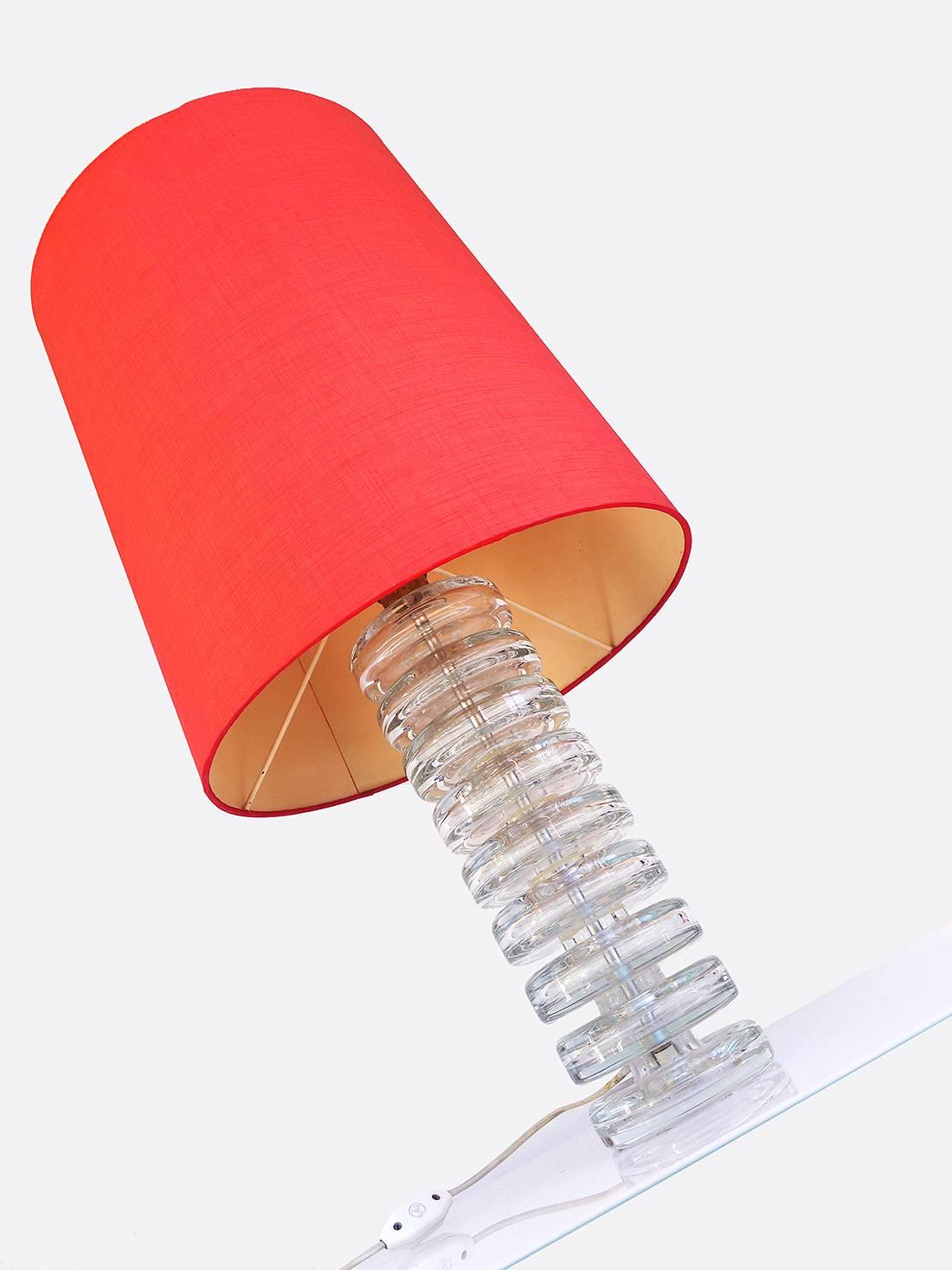 Carl Fagerlund table light with stacked glass disks produced by Orrefors in Sweden in the 1960s.