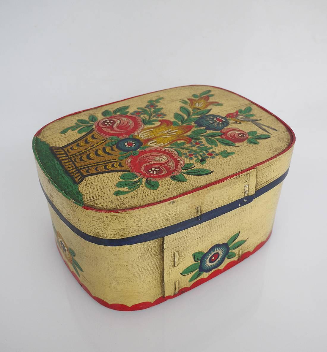 German painted wooden bride's box or container with tole painting made circa 1900.
 