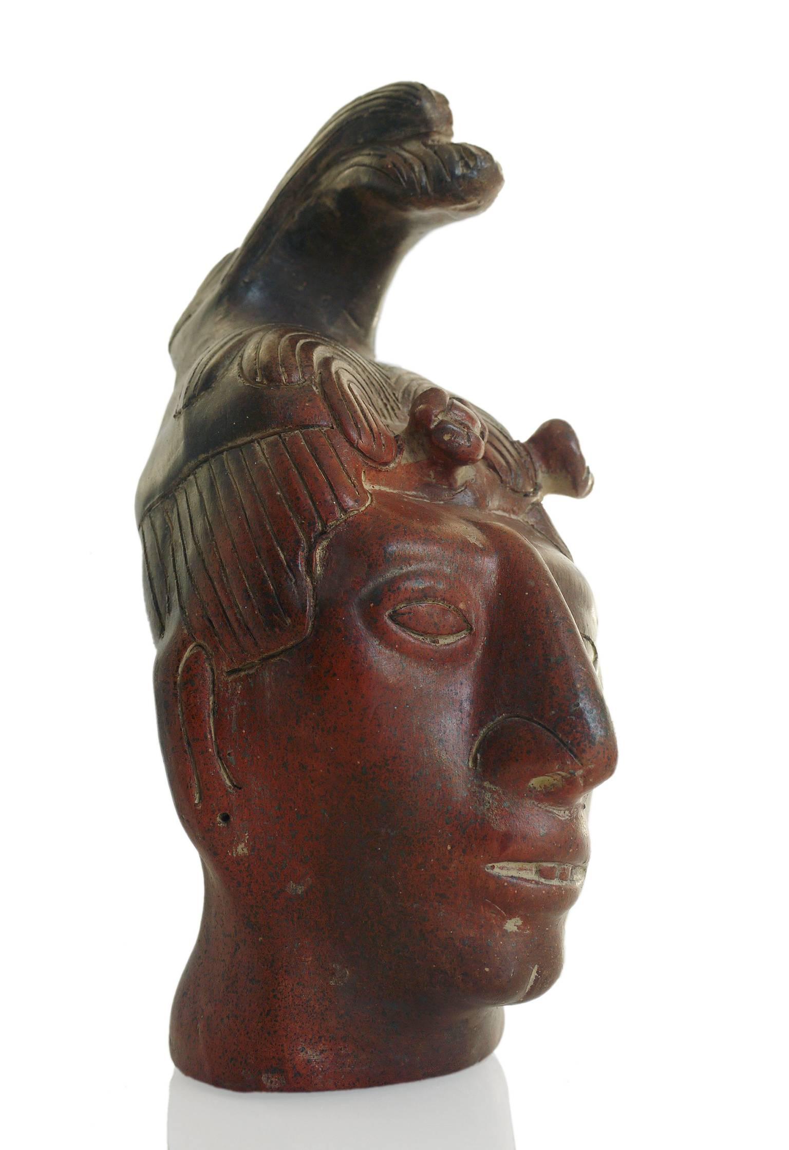 aztec face statue