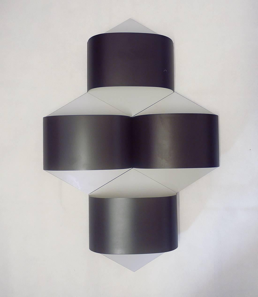 Elegant set of four metal wall panels designed by R. Krueger & D. Witte for Staff Lighting, Germany, 1968. 

Lighting: takes one big Edison E27 base bulb per sconce. 
Condition: very good vintage condition. 

Price is per Set. 

Wiring: the lamp/s