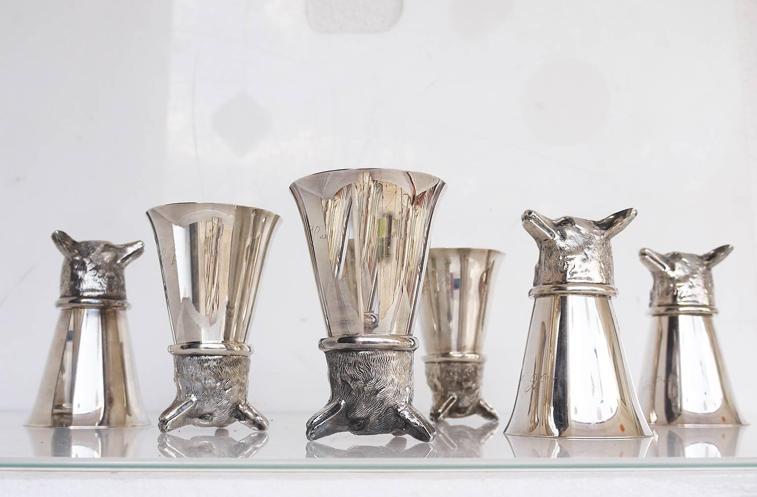 Set of six silver plated stirrup cups, each with a cast fox head.
The stirrup cup was created for holding a drink to be taken while mounted on horseback, usually prior to a hunt moving off.
Marked 