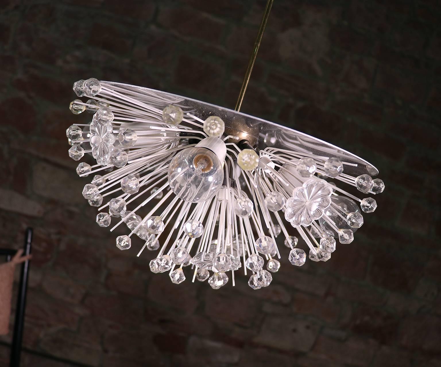 Elegant snowball chandelier with sputnik crystal flowers on a mirrored frame designed by Emil Stejnar for Rupert Nikoll, Vienna, Austria in the 1950s. 

Lighting: takes four small Edison E14 base bulbs. 
Condition: very good vintage condition.