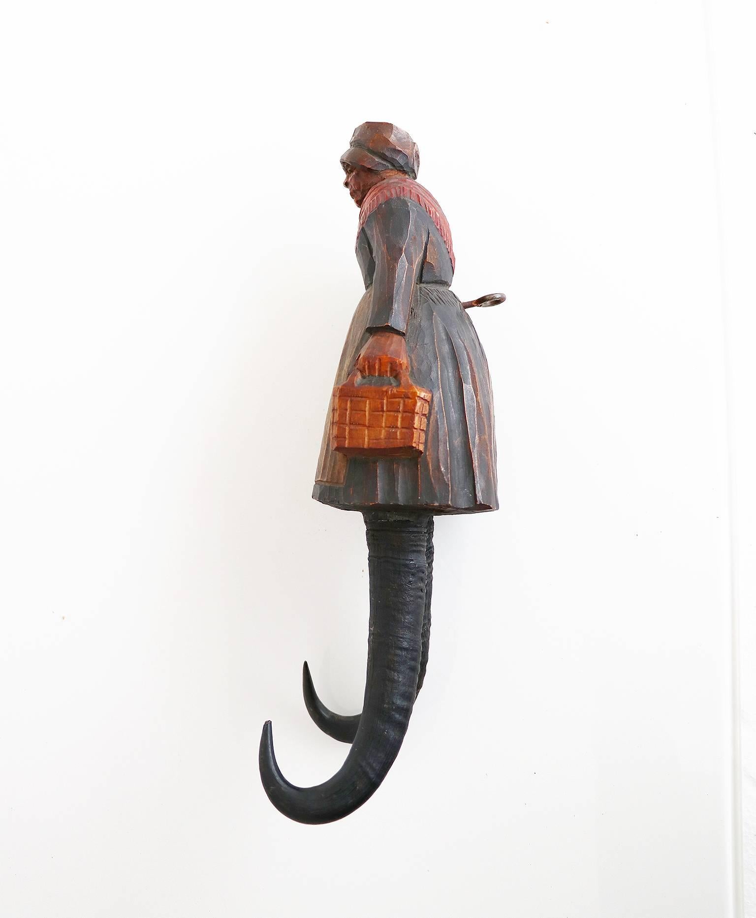 Folk Art Pair of Black Forest Figural Carved Wall Hooks, 19th Century For Sale