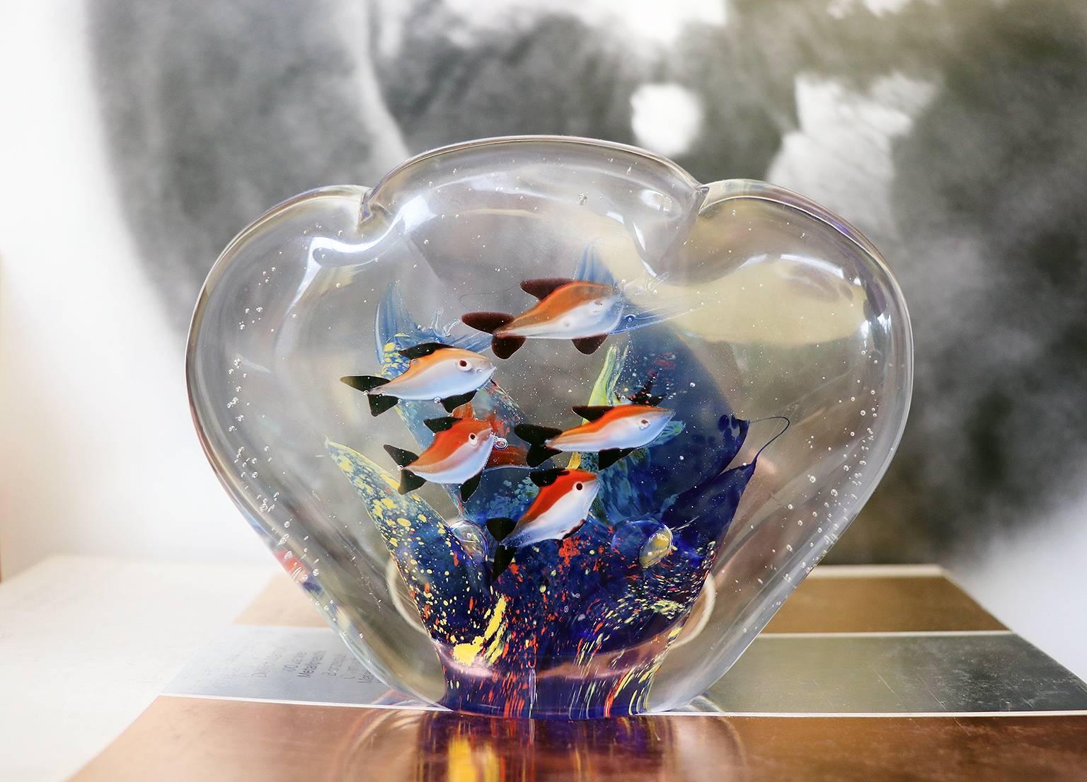 Vintage Murano glass aquarium with nine multicolored fishes. 